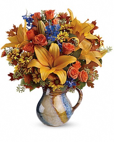 Deluxe size, 16 3/4 inches height and 16 inches wide.