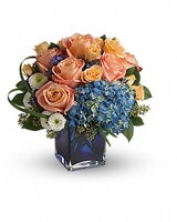 Deluxe size, 12 1/4 inches height and 12 and a half inches wide.
