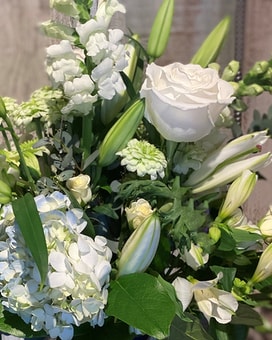 Vase Arrangement size, inches height and inches wide.