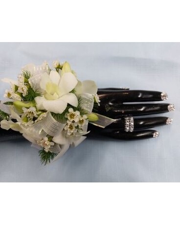 Deluxe Orchid Corsage size, inches height and inches wide.