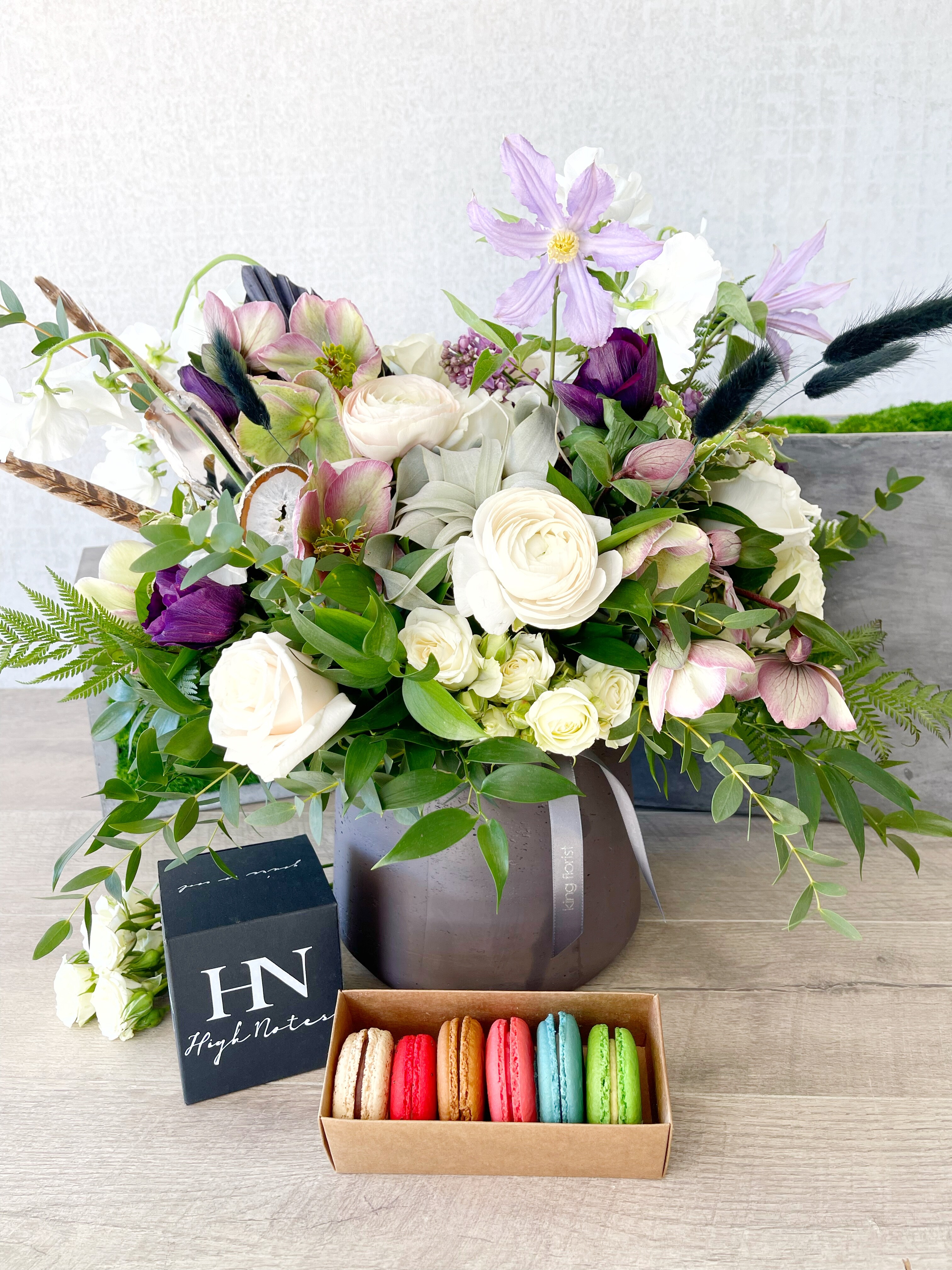Floral Arrangement, Half Dozen Macarons, and Candle size, inches height and inches wide.