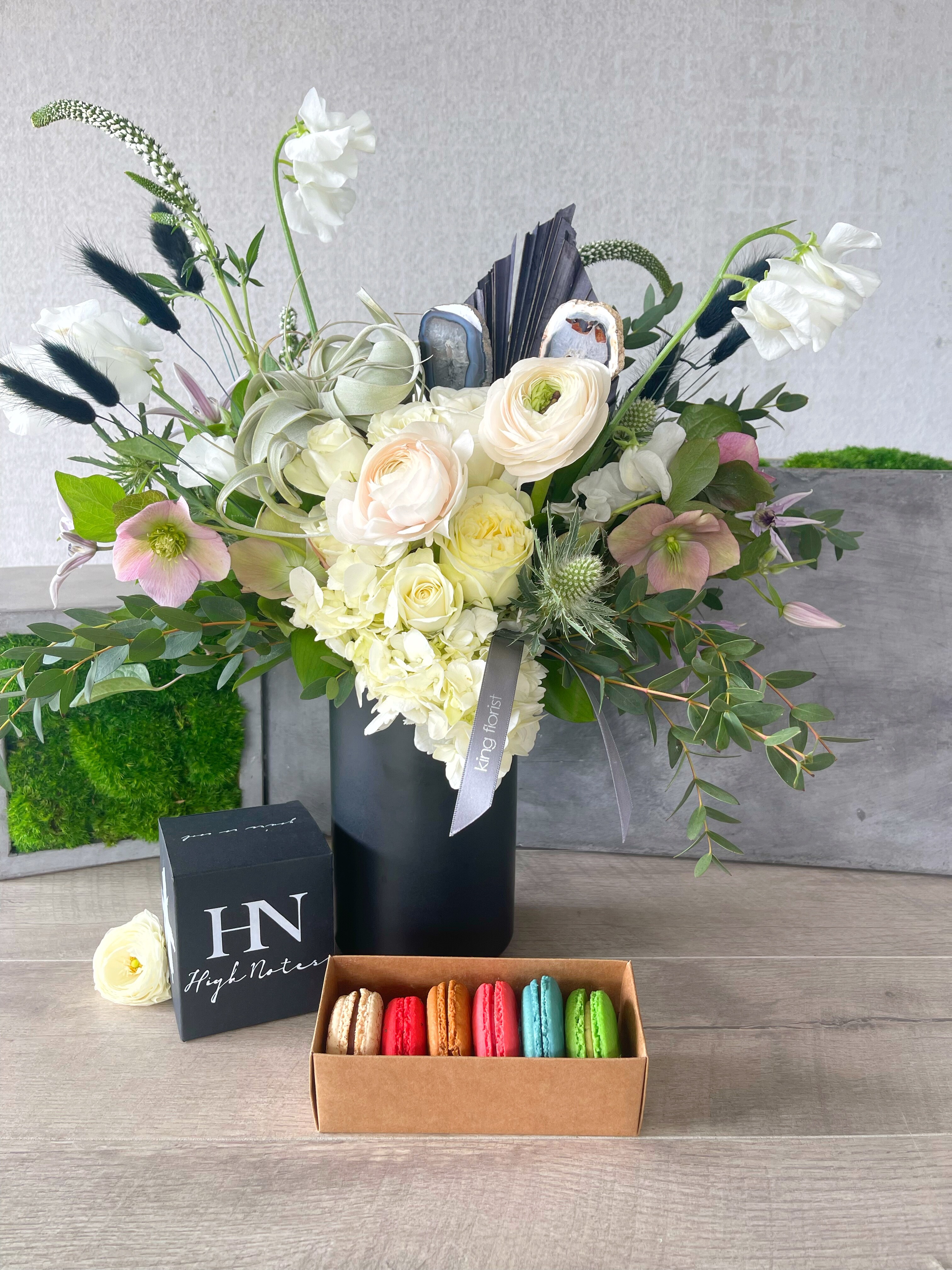 Floral Arrangement, Half Dozen Macarons, and Candle size, inches height and inches wide.