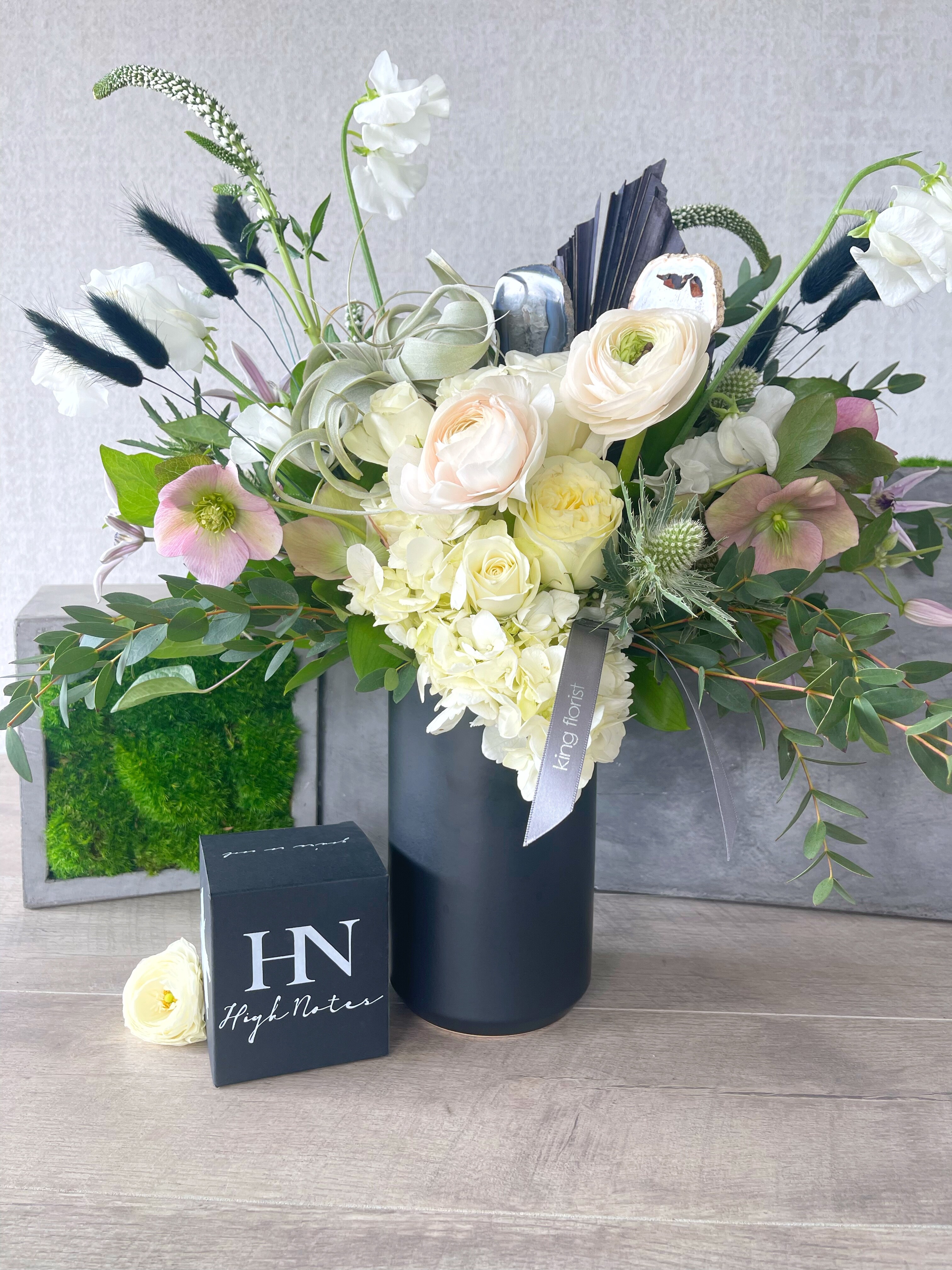Floral Arrangement and Candle size, inches height and inches wide.