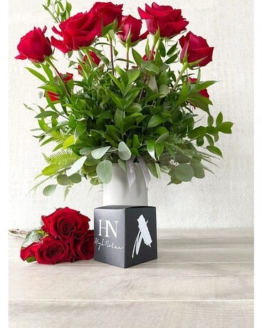 Floral Arrangement and Candle size, inches height and inches wide.
