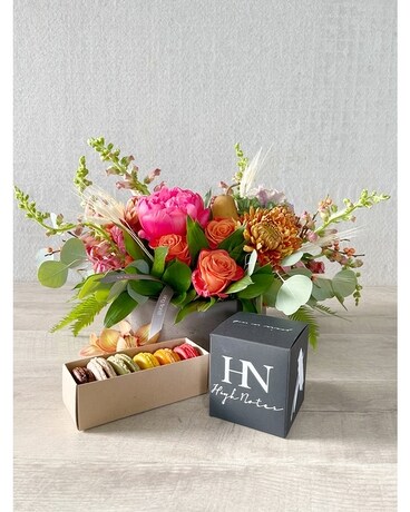 Floral Arrangement, Half Dozen Macarons, and Candle size, inches height and inches wide.