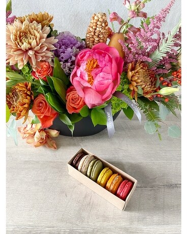 Floral Arrangement and Half Dozen Macarons size, inches height and inches wide.