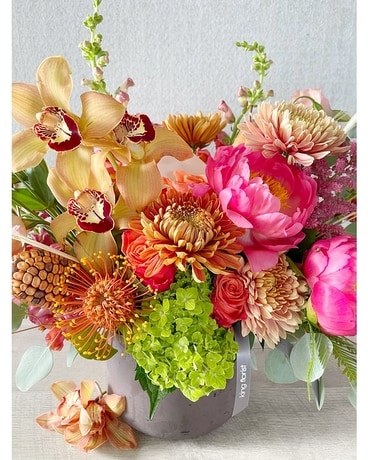 Floral Arrangement and Candle size, inches height and inches wide.