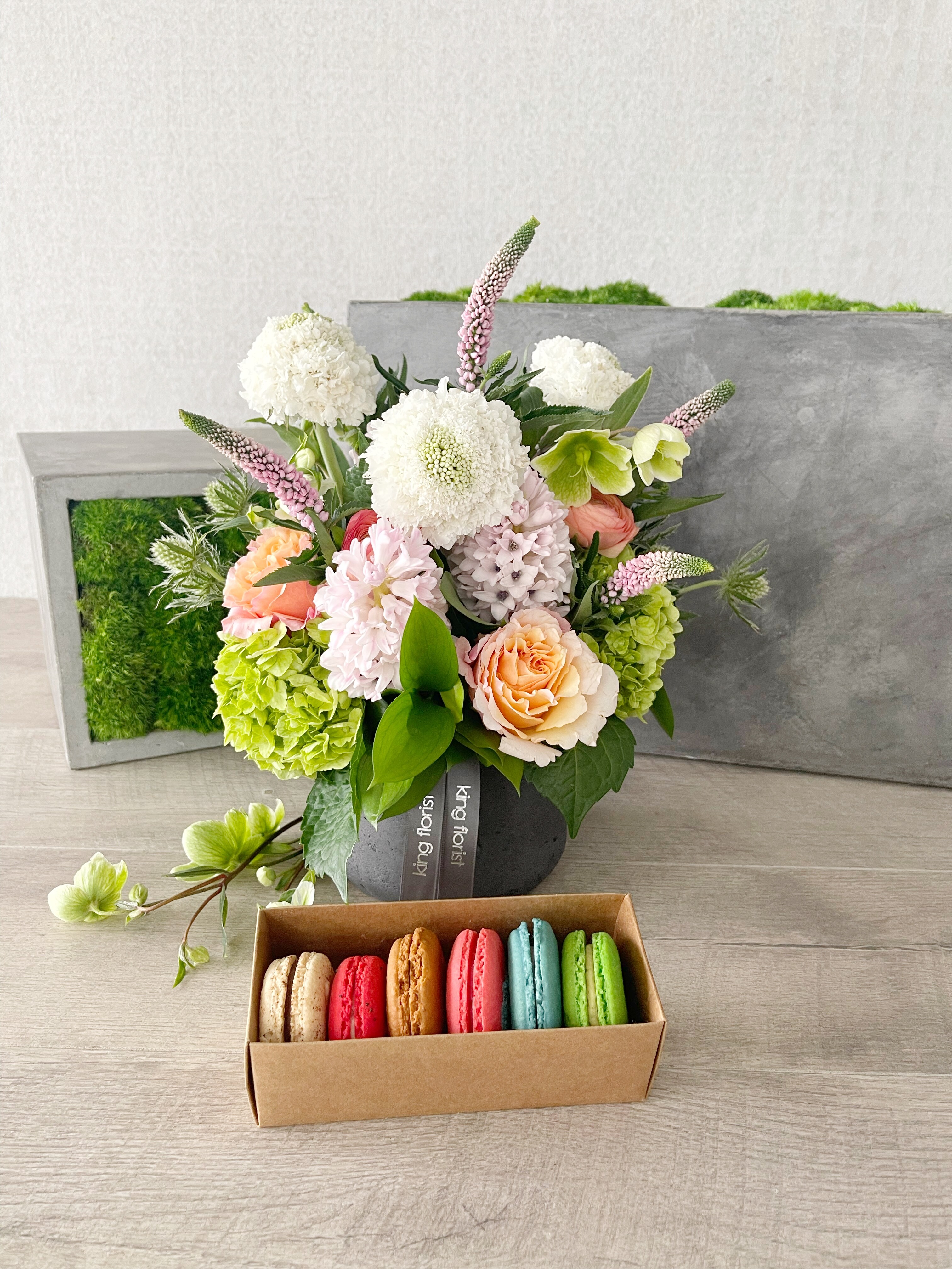 Floral Arrangement and Half Dozen Macarons size, inches height and inches wide.