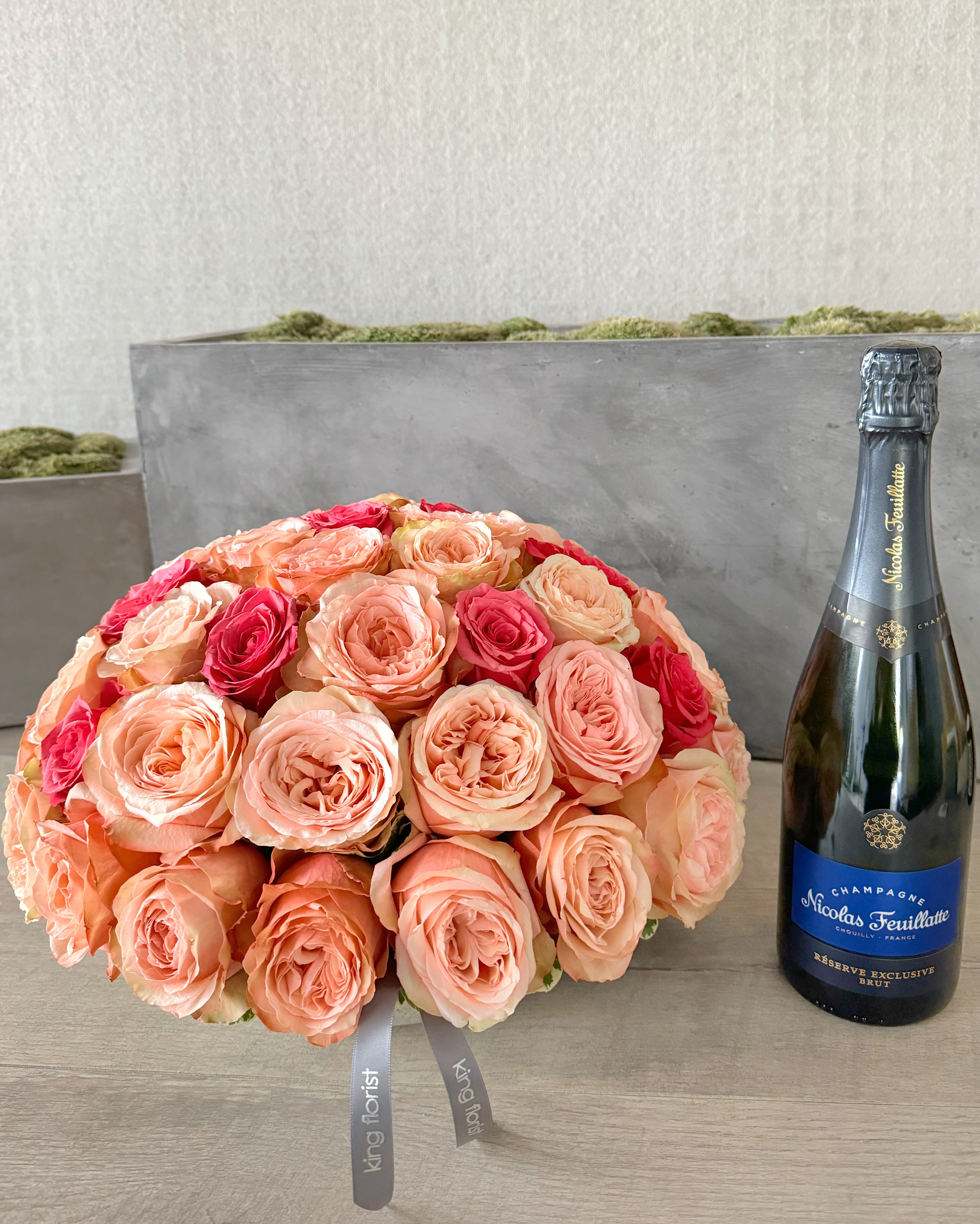Floral Arrangement and Champagne size, inches height and inches wide.