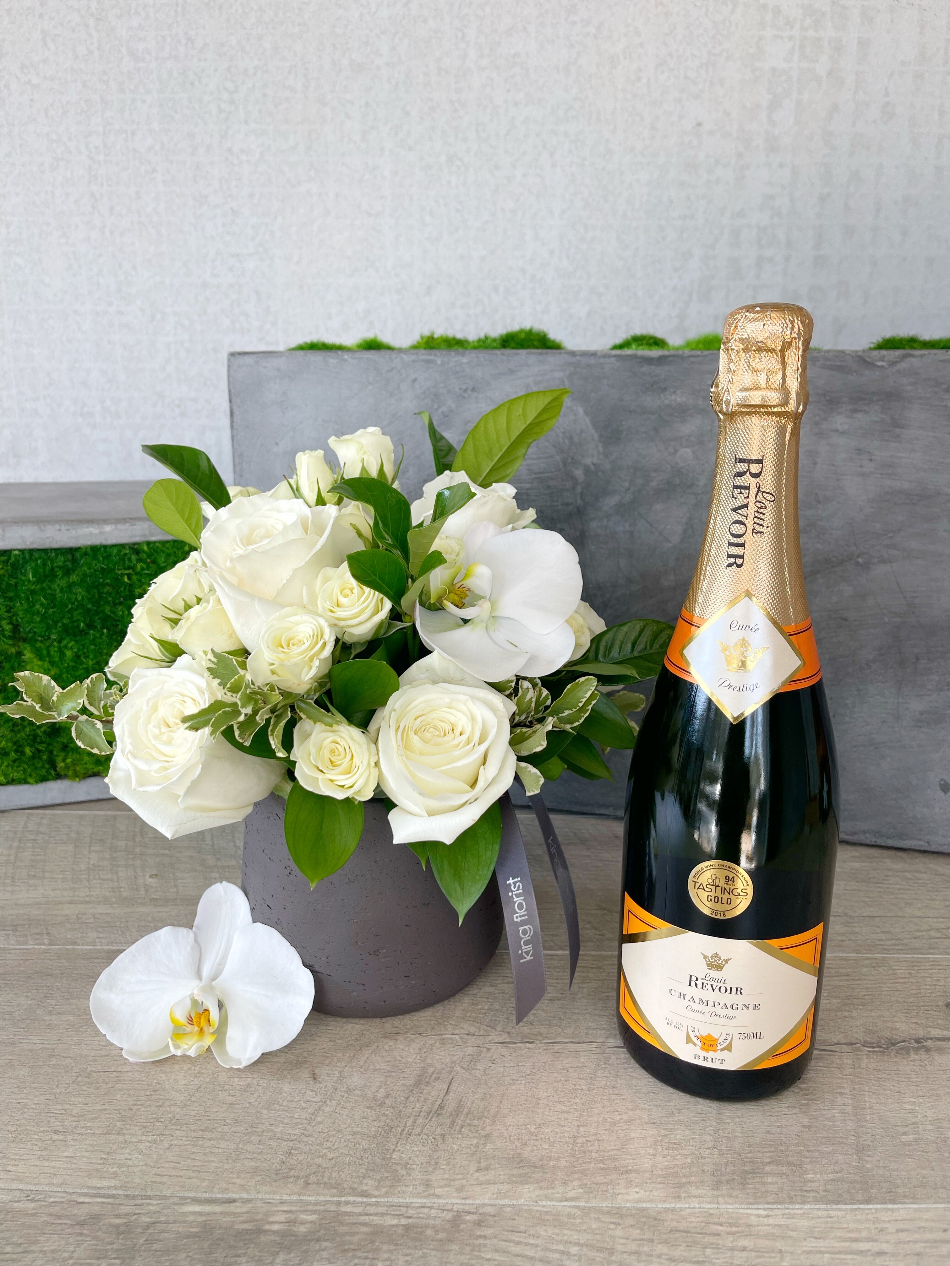 Floral Arrangement and Champagne size, inches height and inches wide.