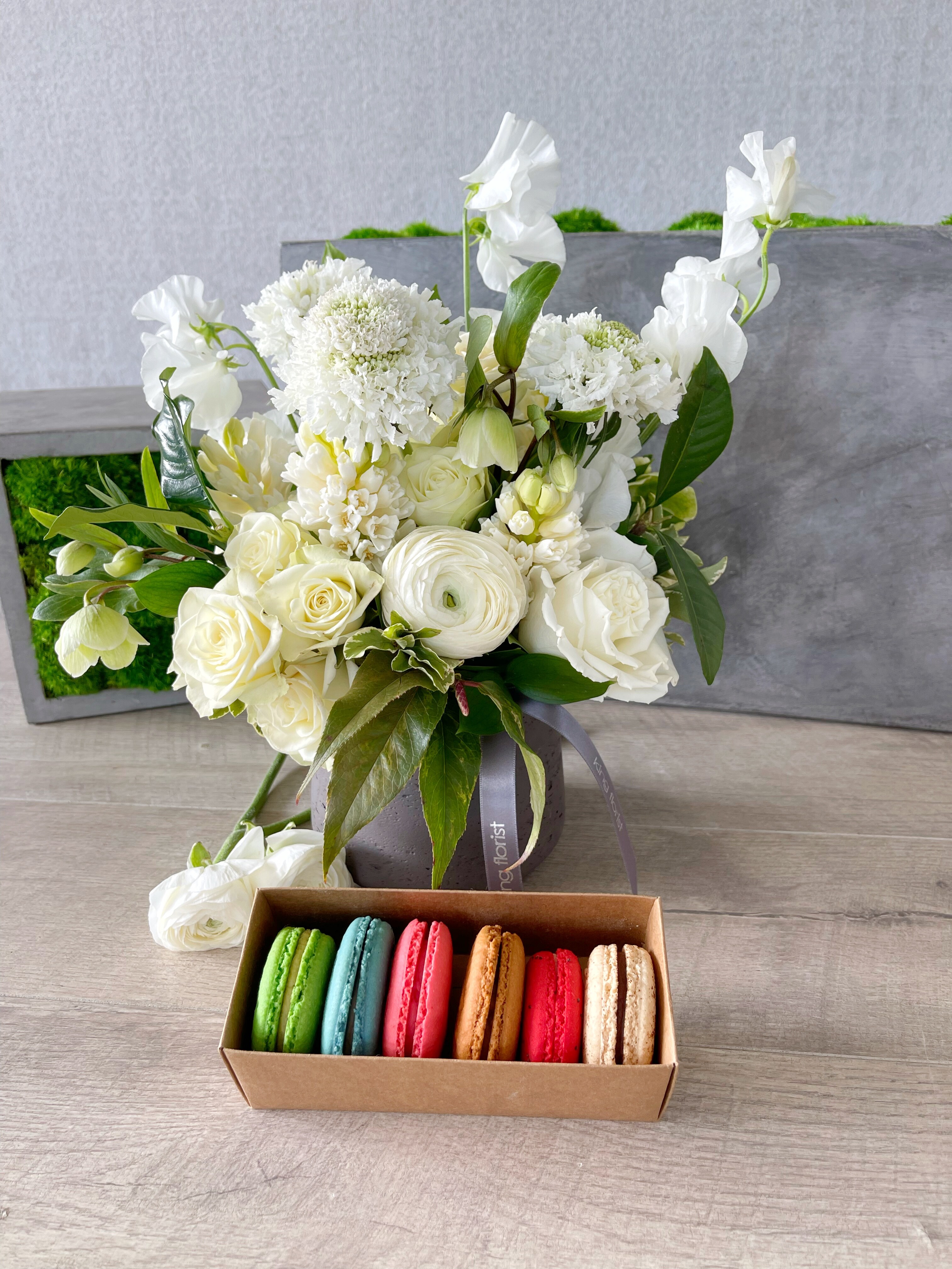 Floral Arrangement and Half Dozen Macarons size, inches height and inches wide.