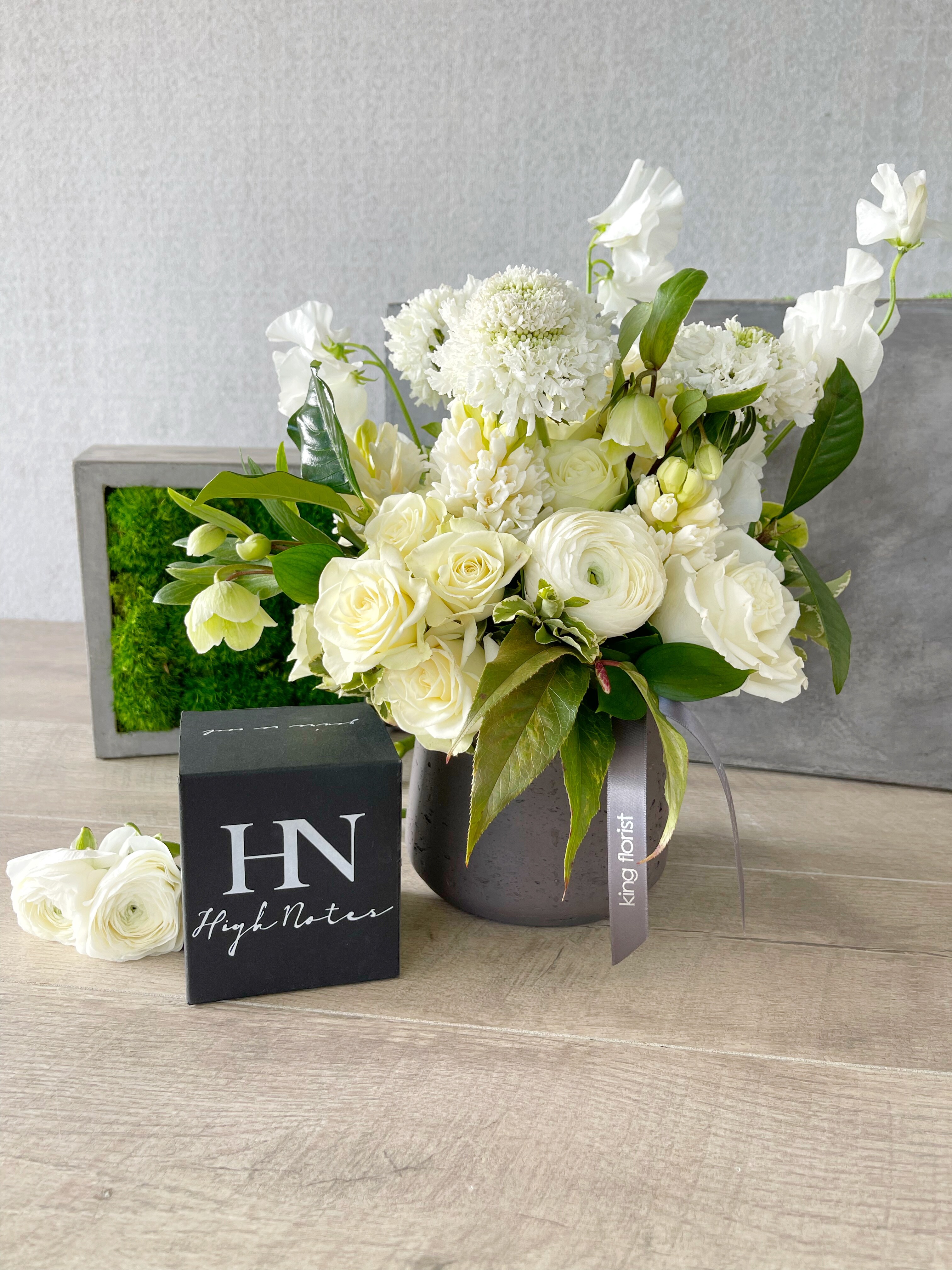 Floral Arrangement and Candle size, inches height and inches wide.