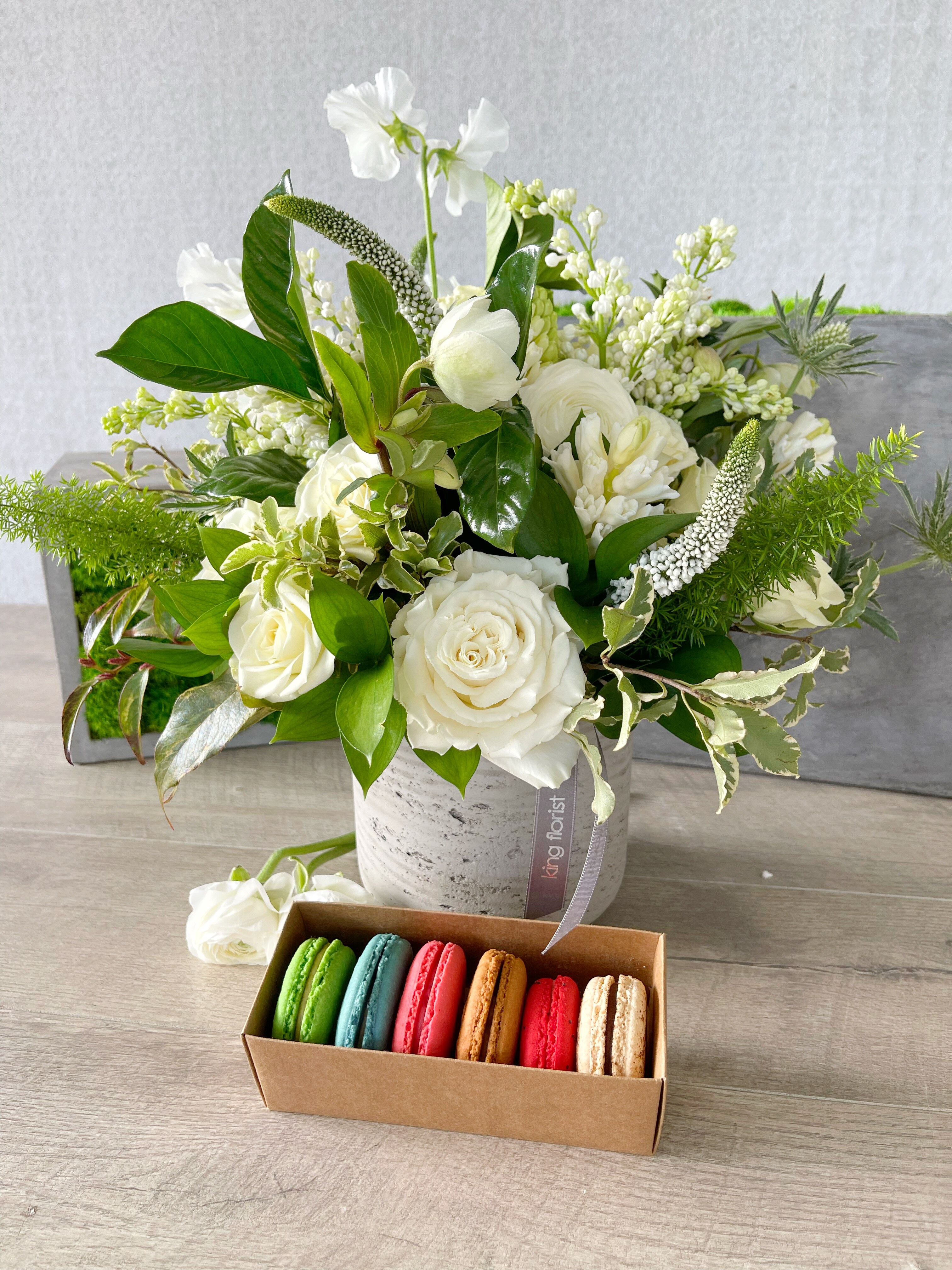 Floral Arrangement and Half Dozen Macarons size, inches height and inches wide.