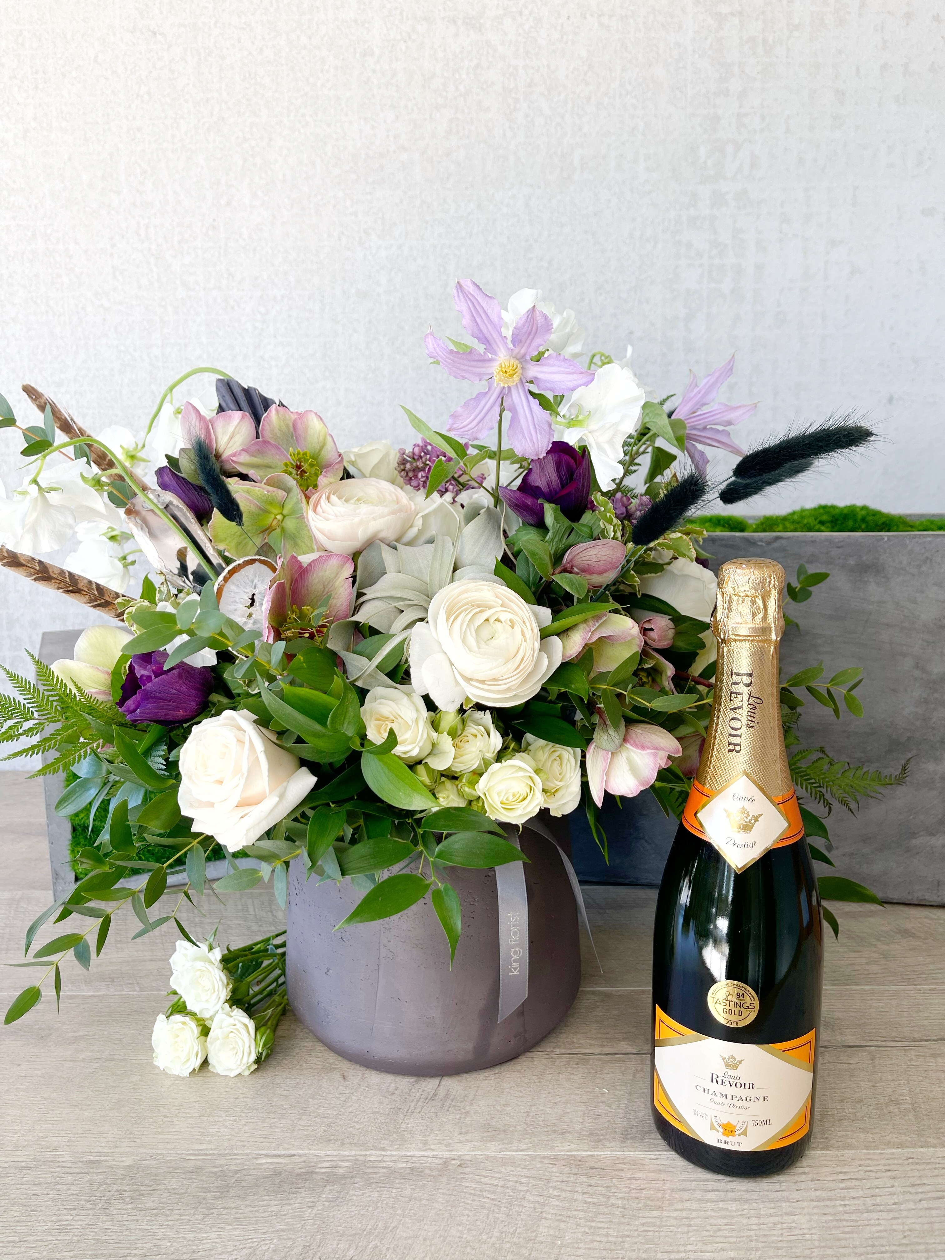 Floral Arrangement and Champagne size, inches height and inches wide.