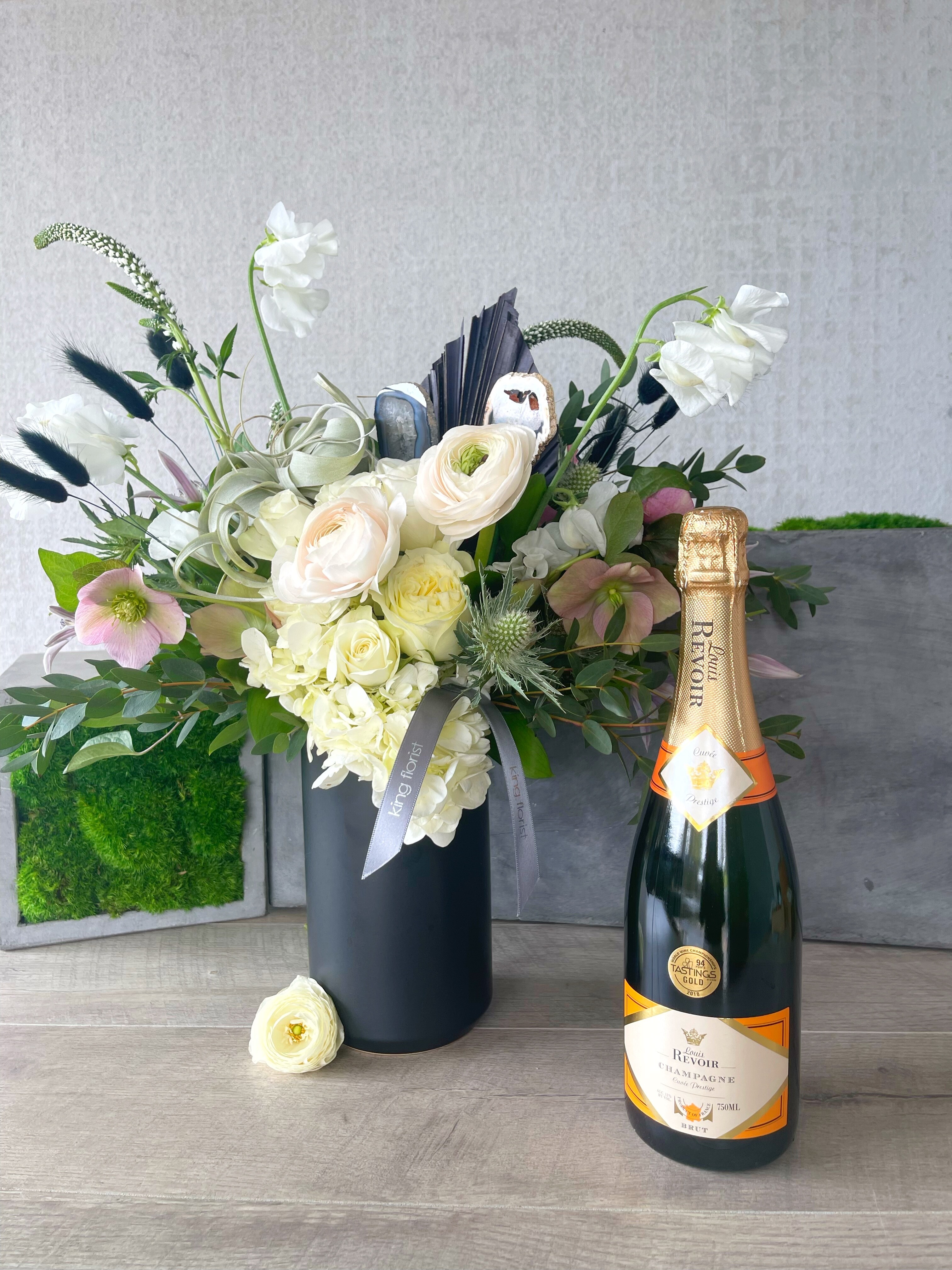 Floral Arrangement and Champagne size, inches height and inches wide.