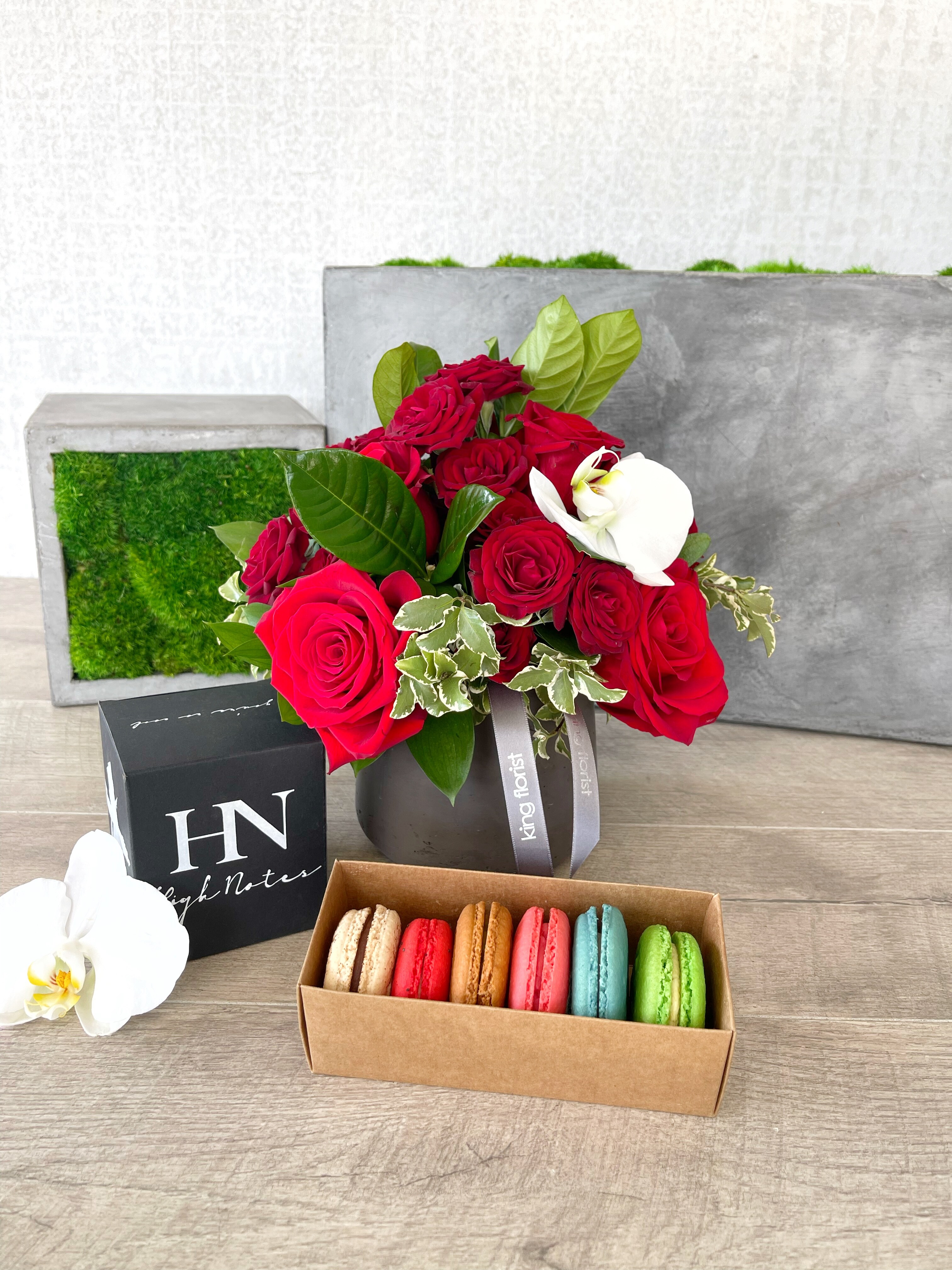Floral Arrangement, Half Dozen Macarons, and Candle size, inches height and inches wide.