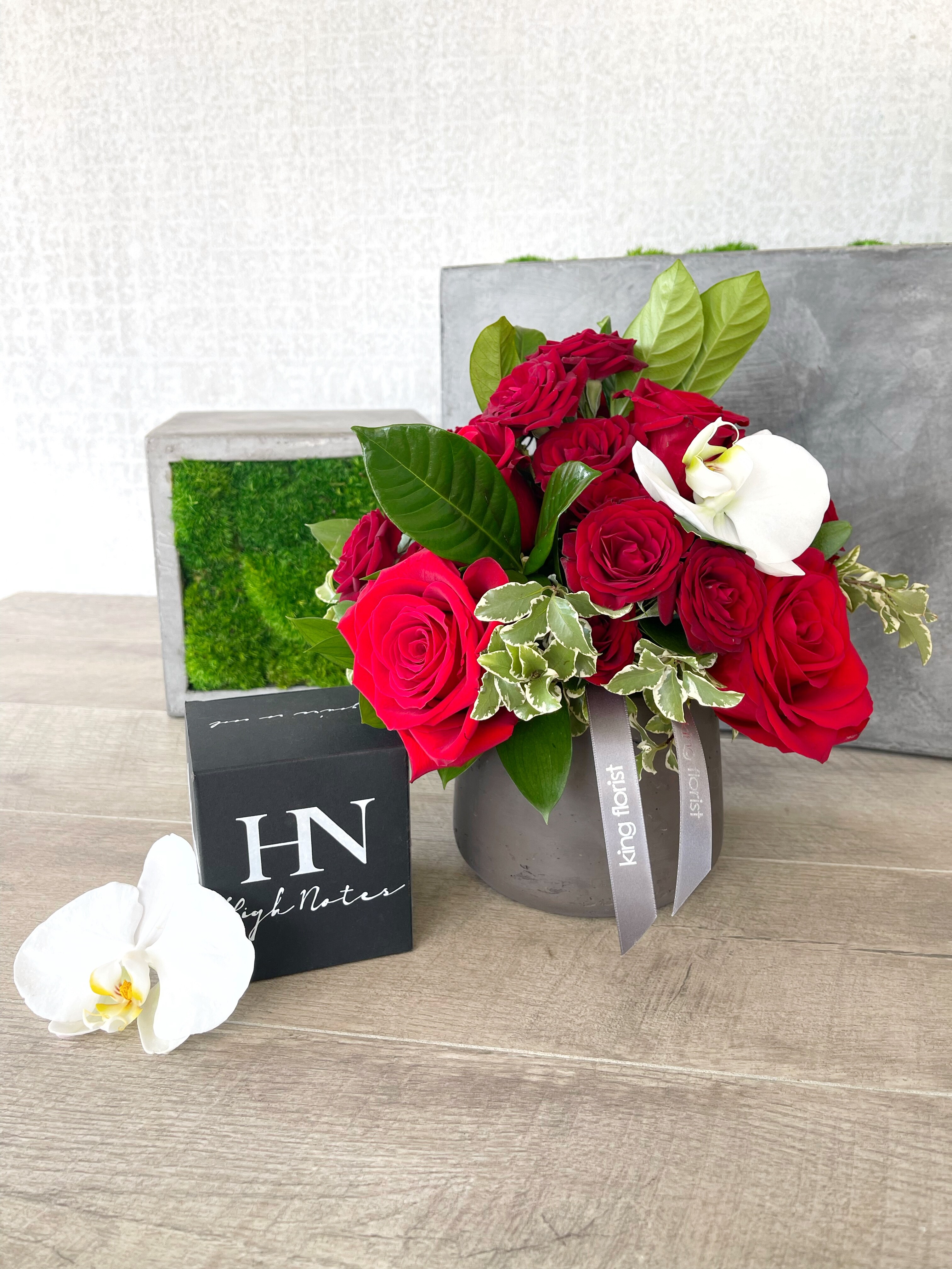 Floral Arrangement and Candle size, inches height and inches wide.