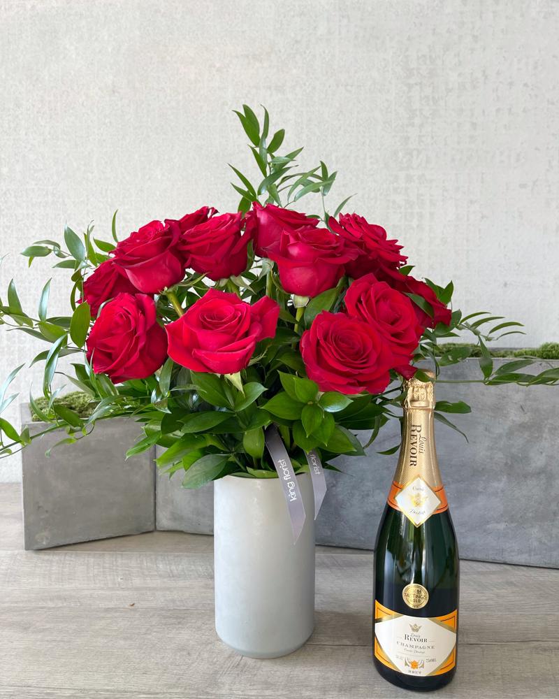 Floral Arrangement and Champagne size, inches height and inches wide.