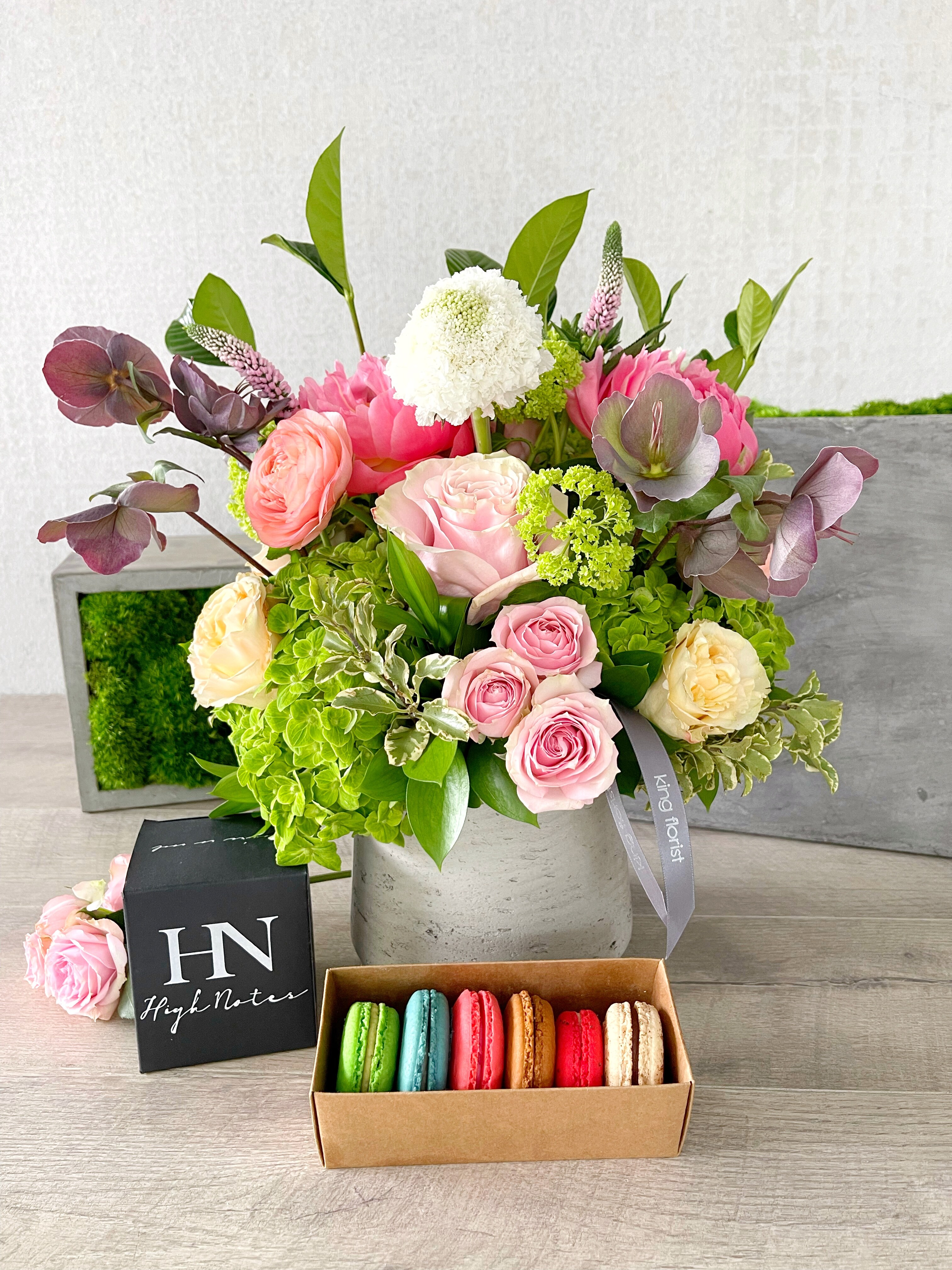 Floral Arrangement, Half Dozen Macarons, and Candle size, inches height and inches wide.