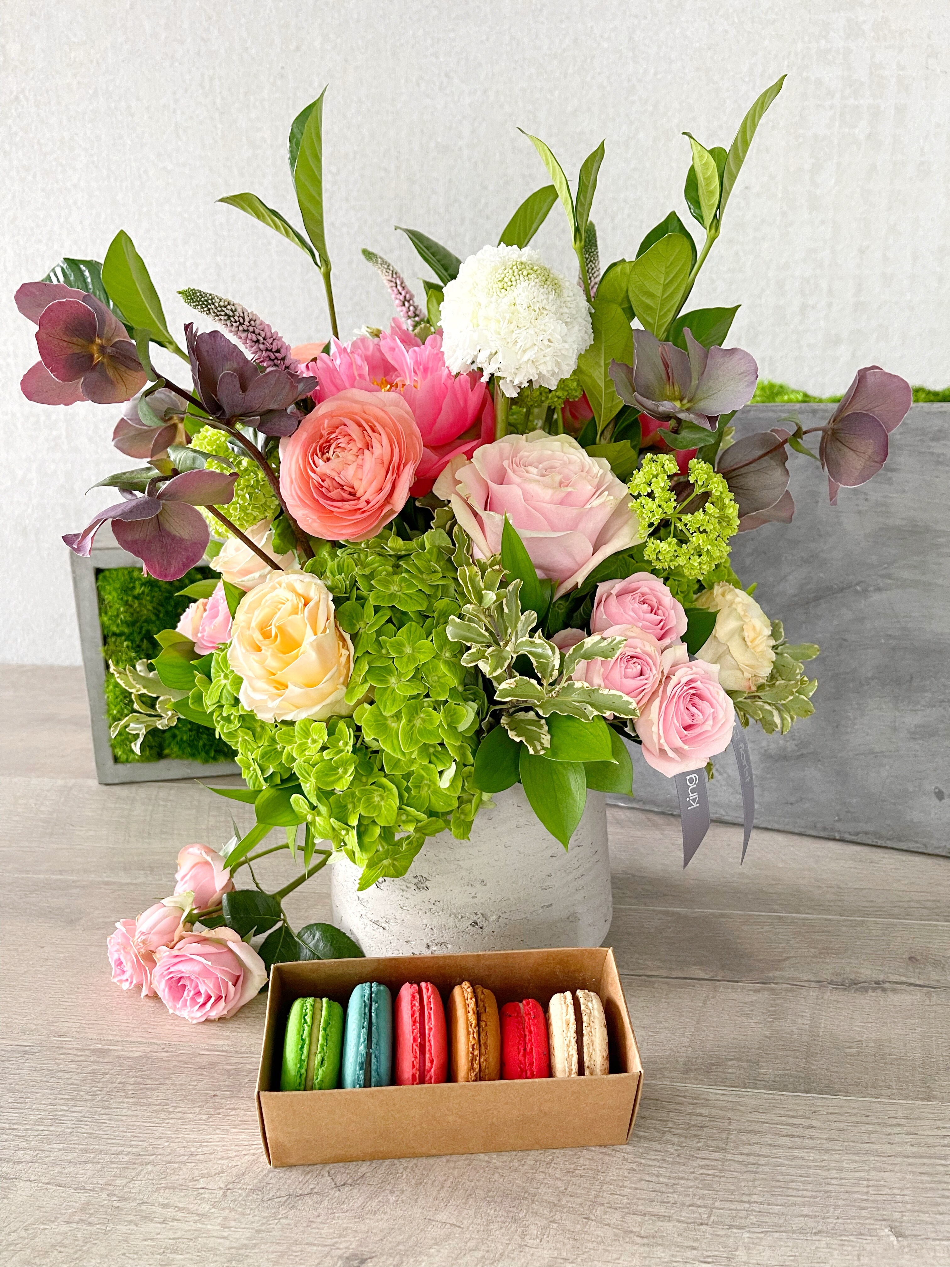 Floral Arrangement and Half Dozen Macarons size, inches height and inches wide.