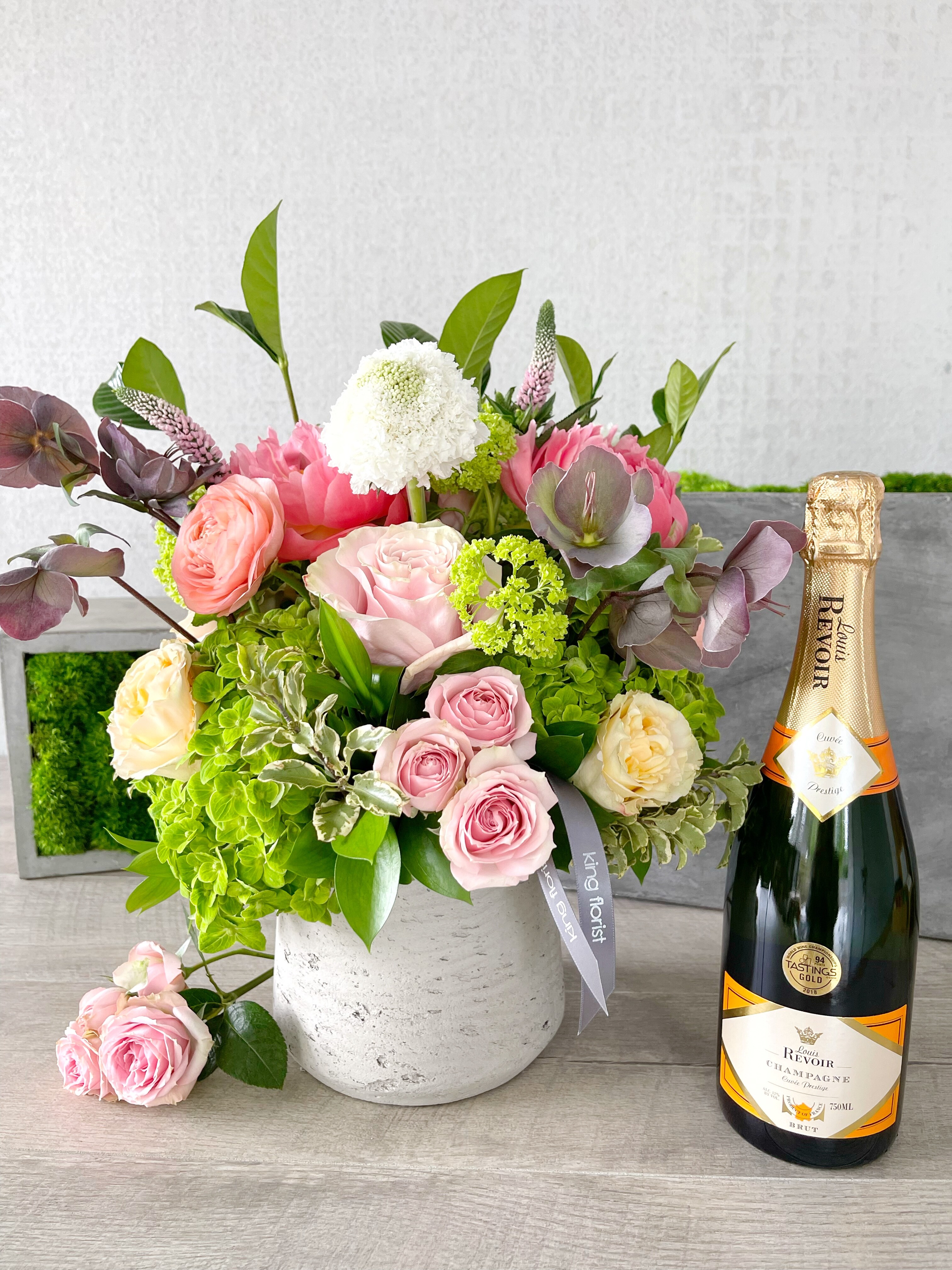 Floral Arrangement and Champagne size, inches height and inches wide.