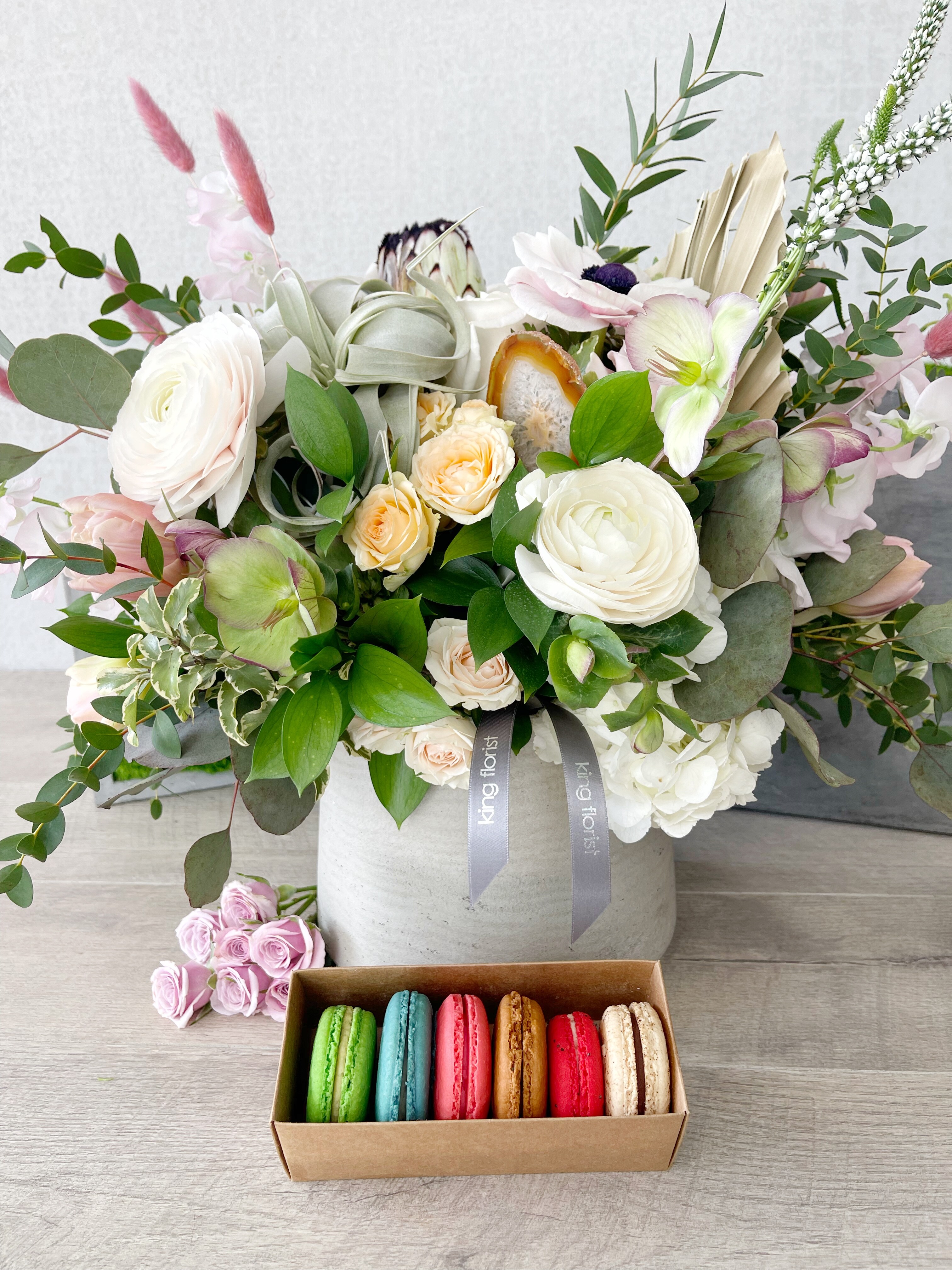 Floral Arrangement and Half Dozen Macarons size, inches height and inches wide.