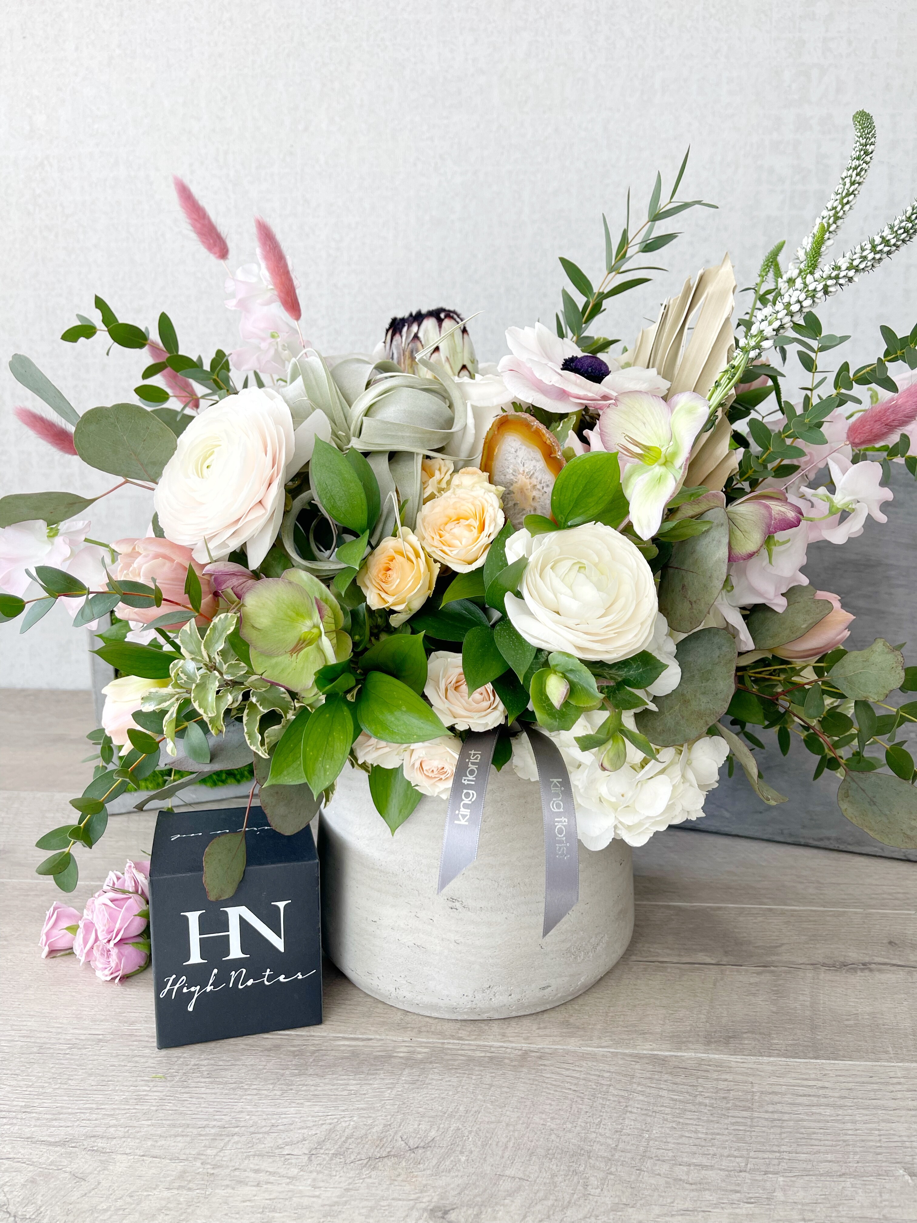 Floral Arrangement and Candle size, inches height and inches wide.