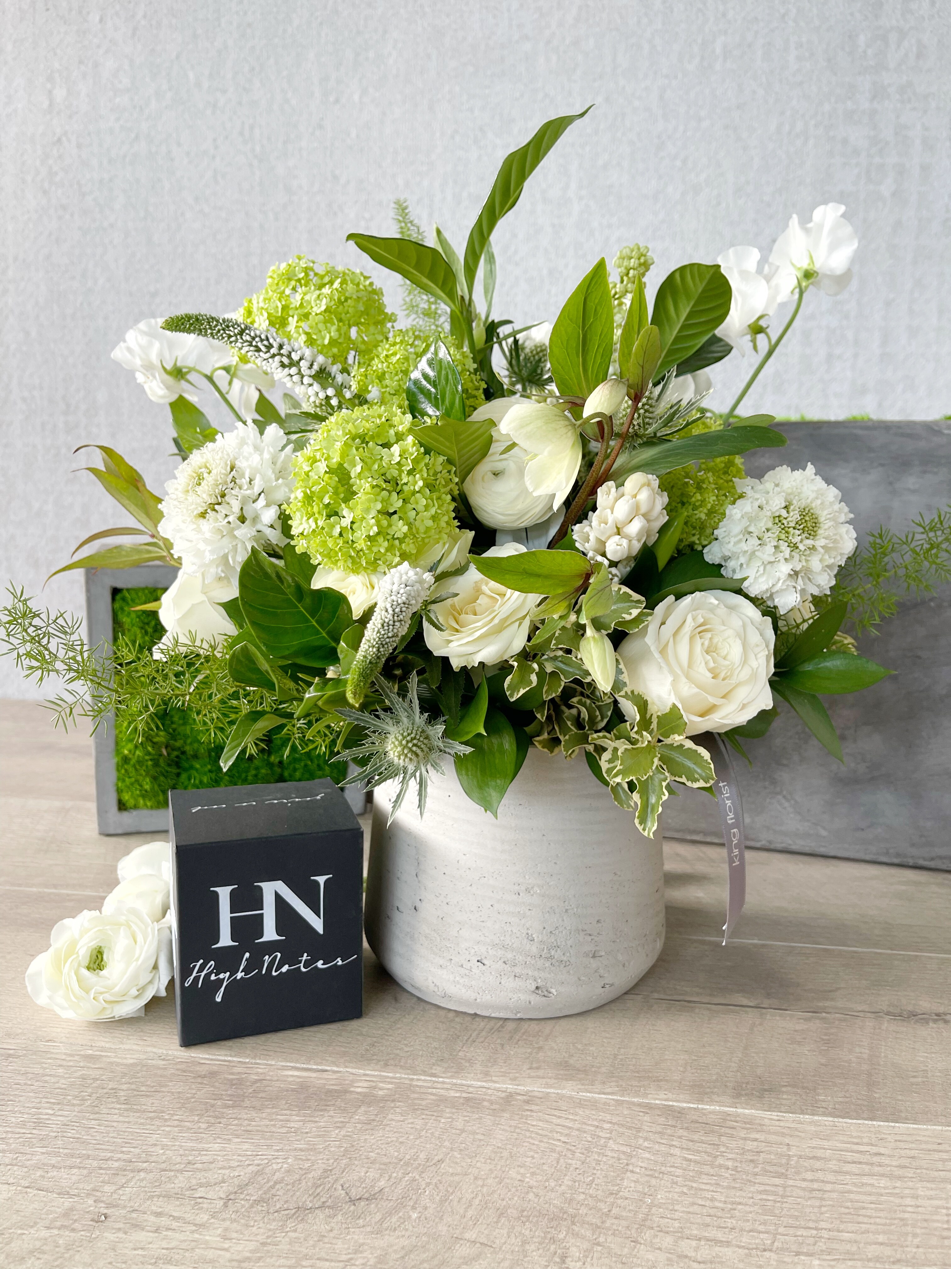 Floral Arrangement and Candle size, inches height and inches wide.