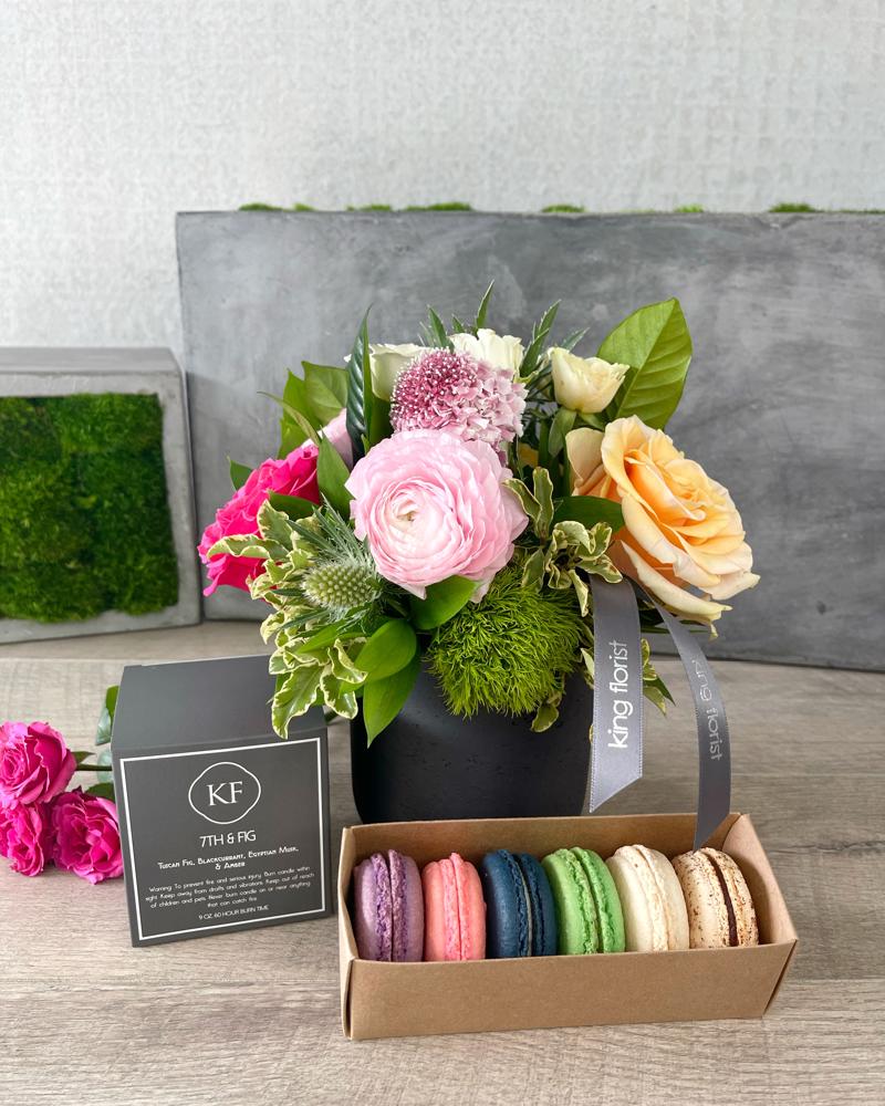 Floral Arrangement, Half Dozen Macarons, and Candle size, inches height and inches wide.