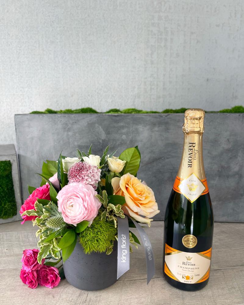 Floral Arrangement and Champagne size, inches height and inches wide.