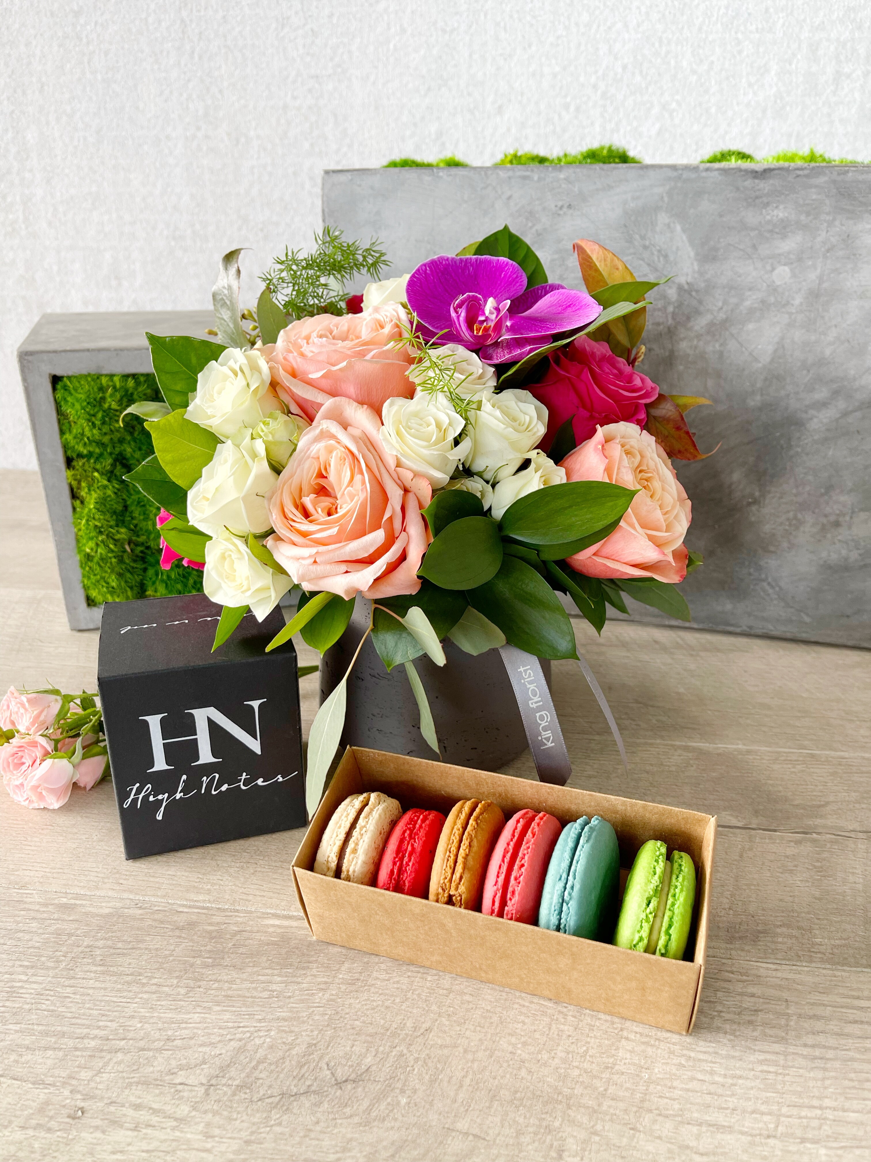 Floral Arrangement, Half Dozen Macarons, and Candle size, inches height and inches wide.