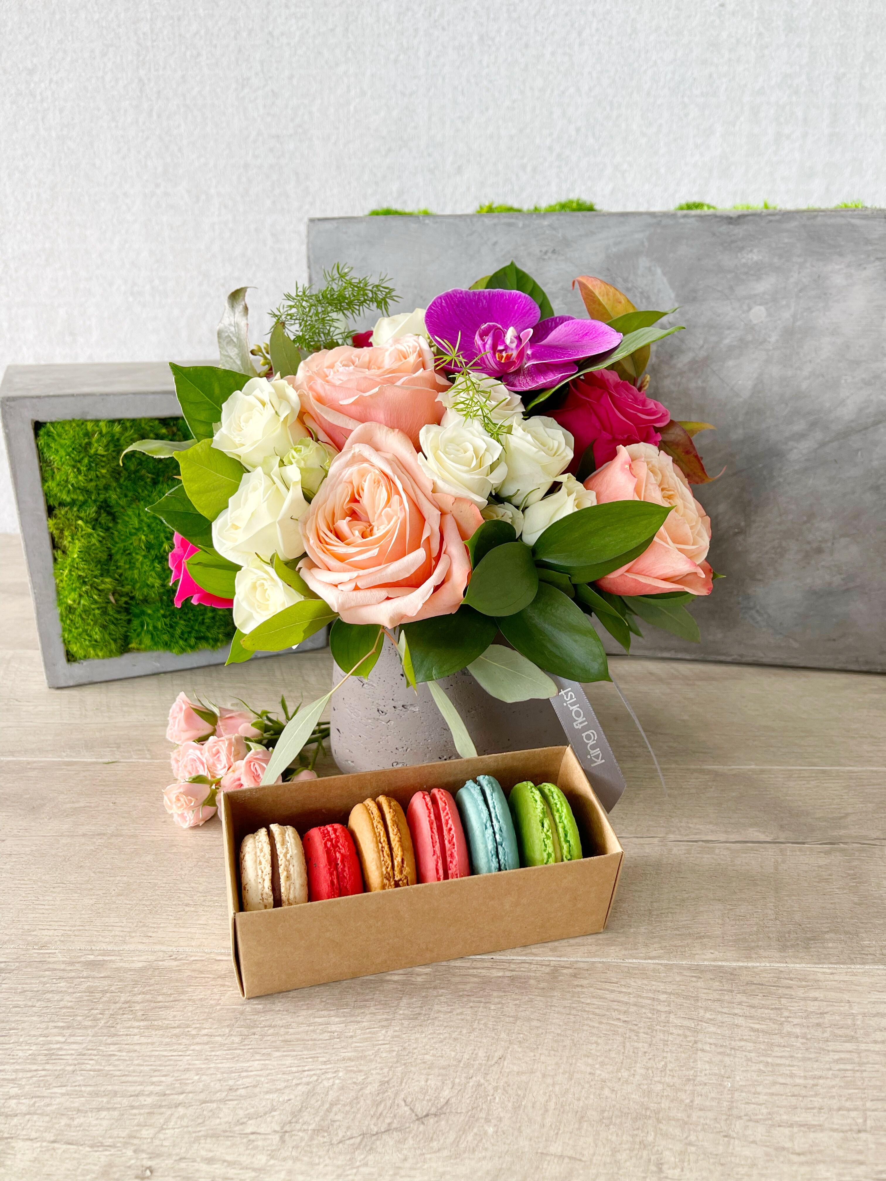 Floral Arrangement and Half Dozen Macarons size, inches height and inches wide.