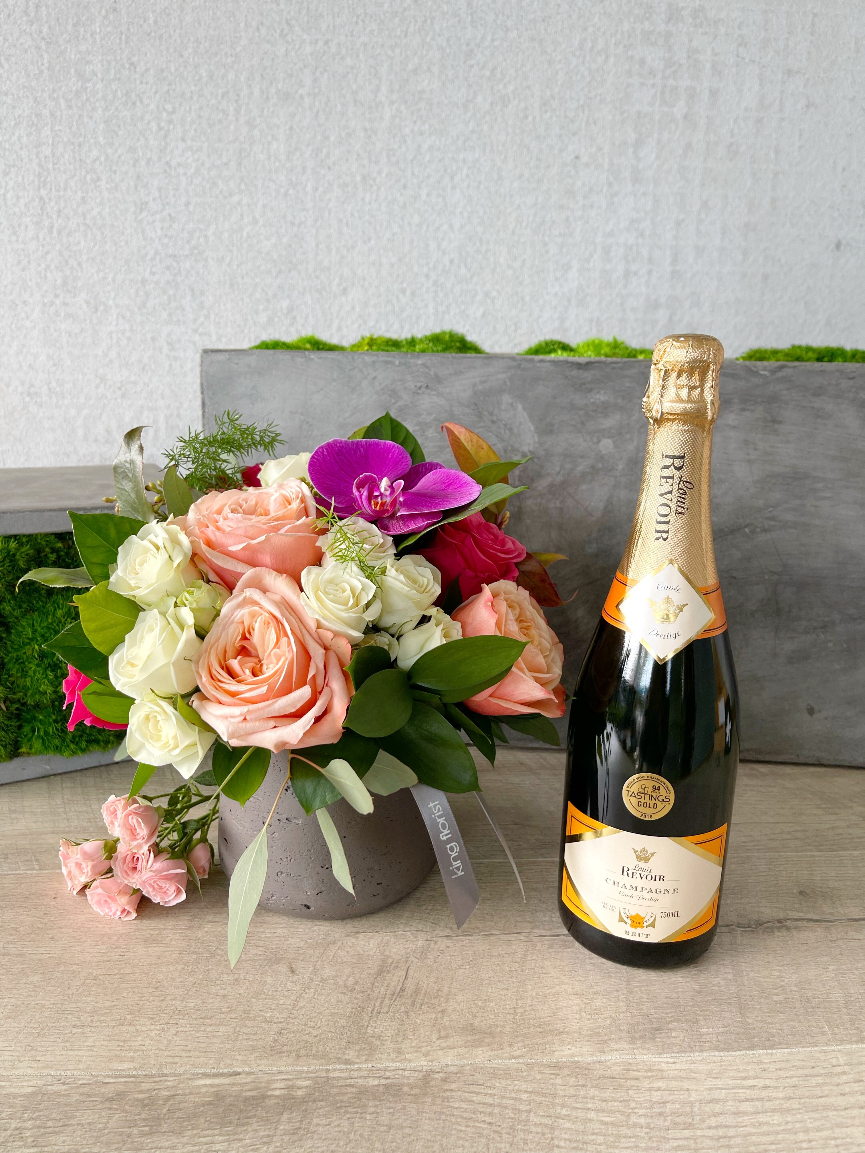 Floral Arrangement and Champagne size, inches height and inches wide.