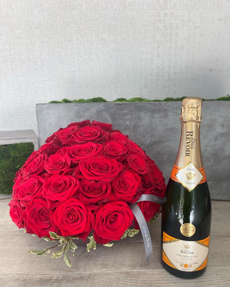 Floral Arrangement and Champagne size, inches height and inches wide.