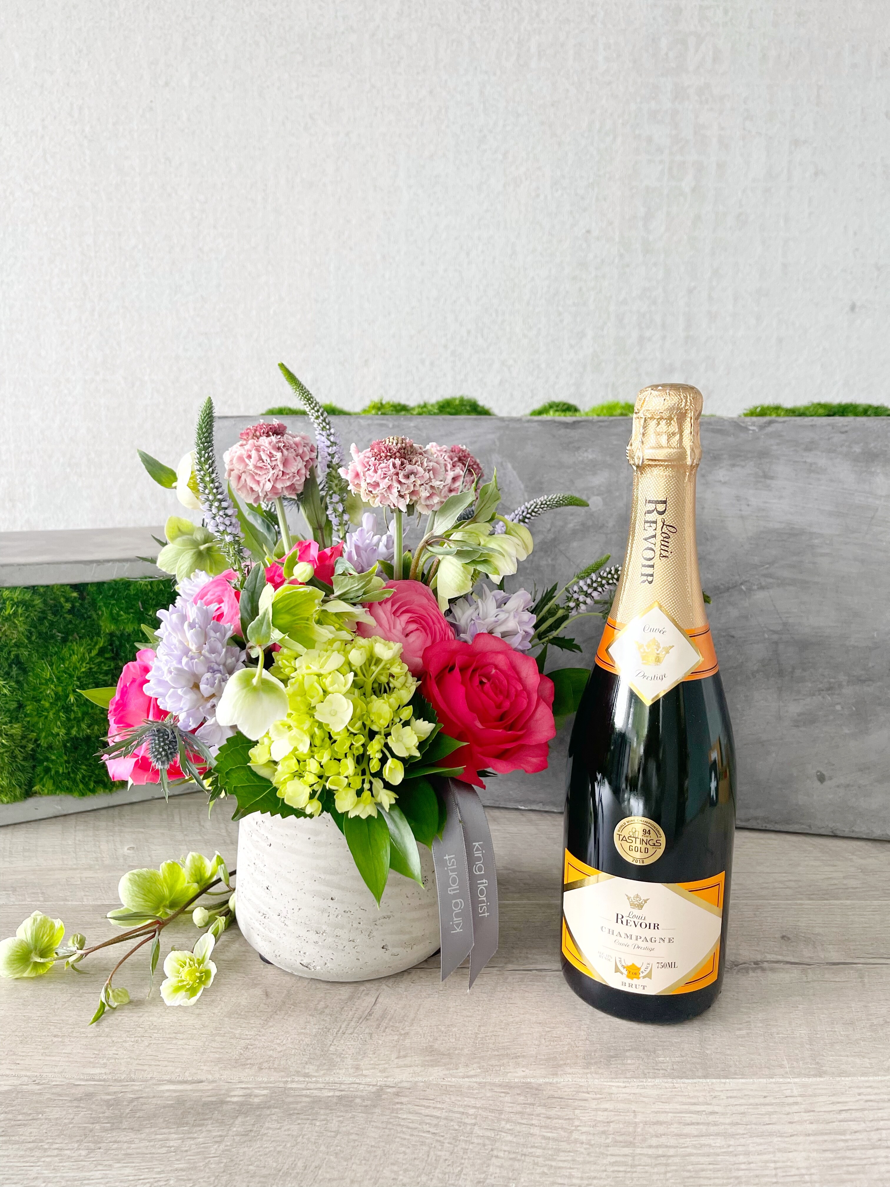 Floral Arrangement and Champagne size, inches height and inches wide.