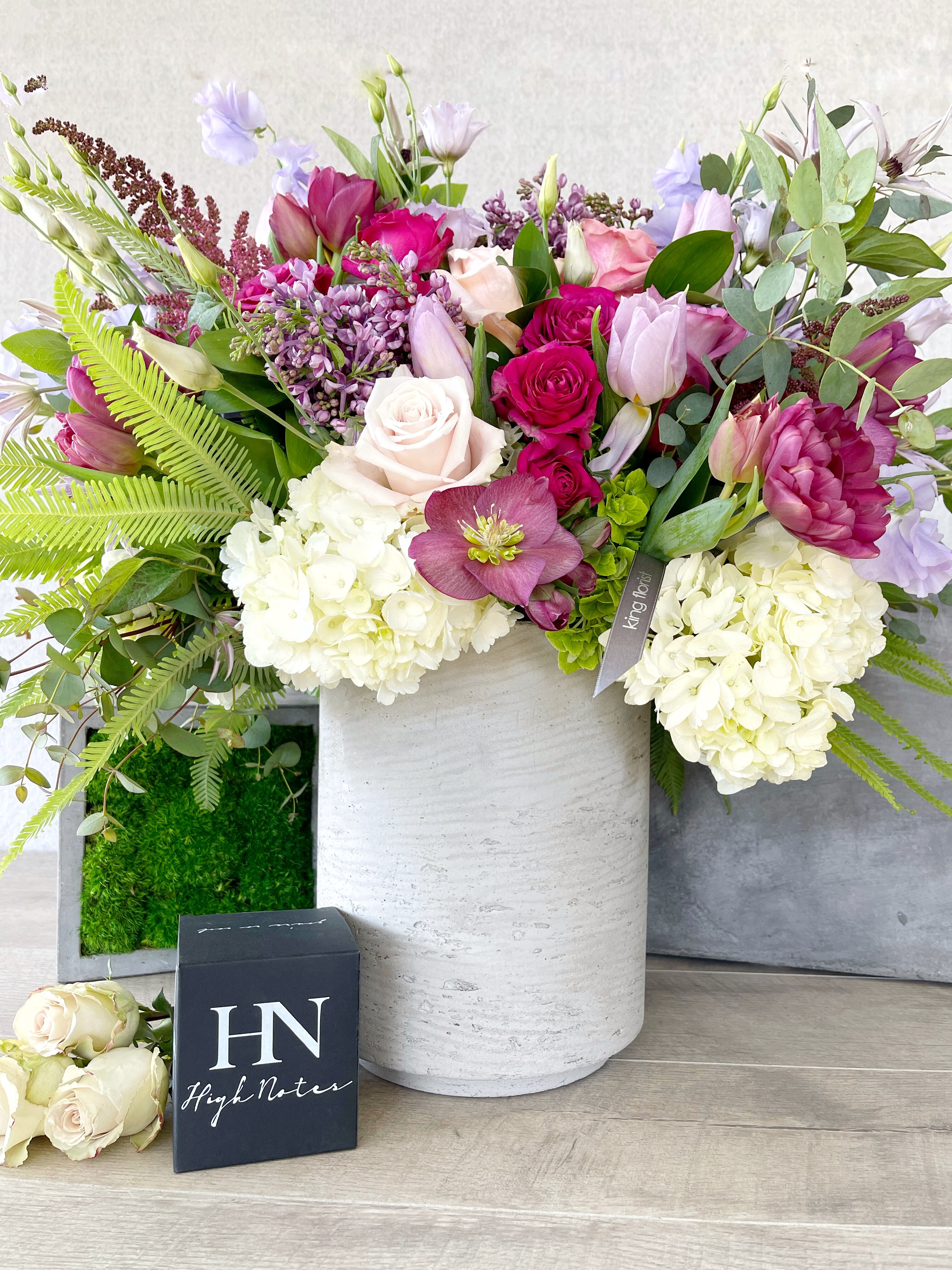 Floral Arrangement and Candle size, inches height and inches wide.