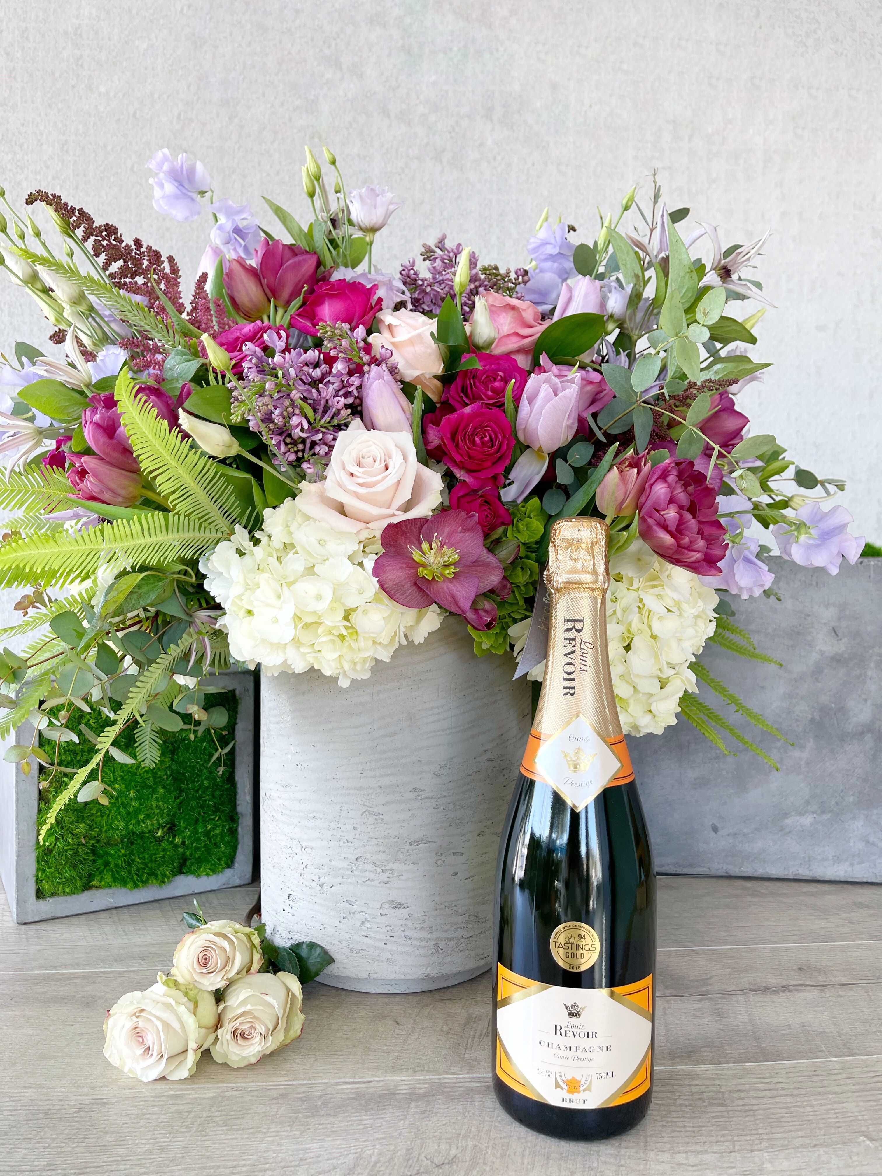 Floral Arrangement and Champagne size, inches height and inches wide.