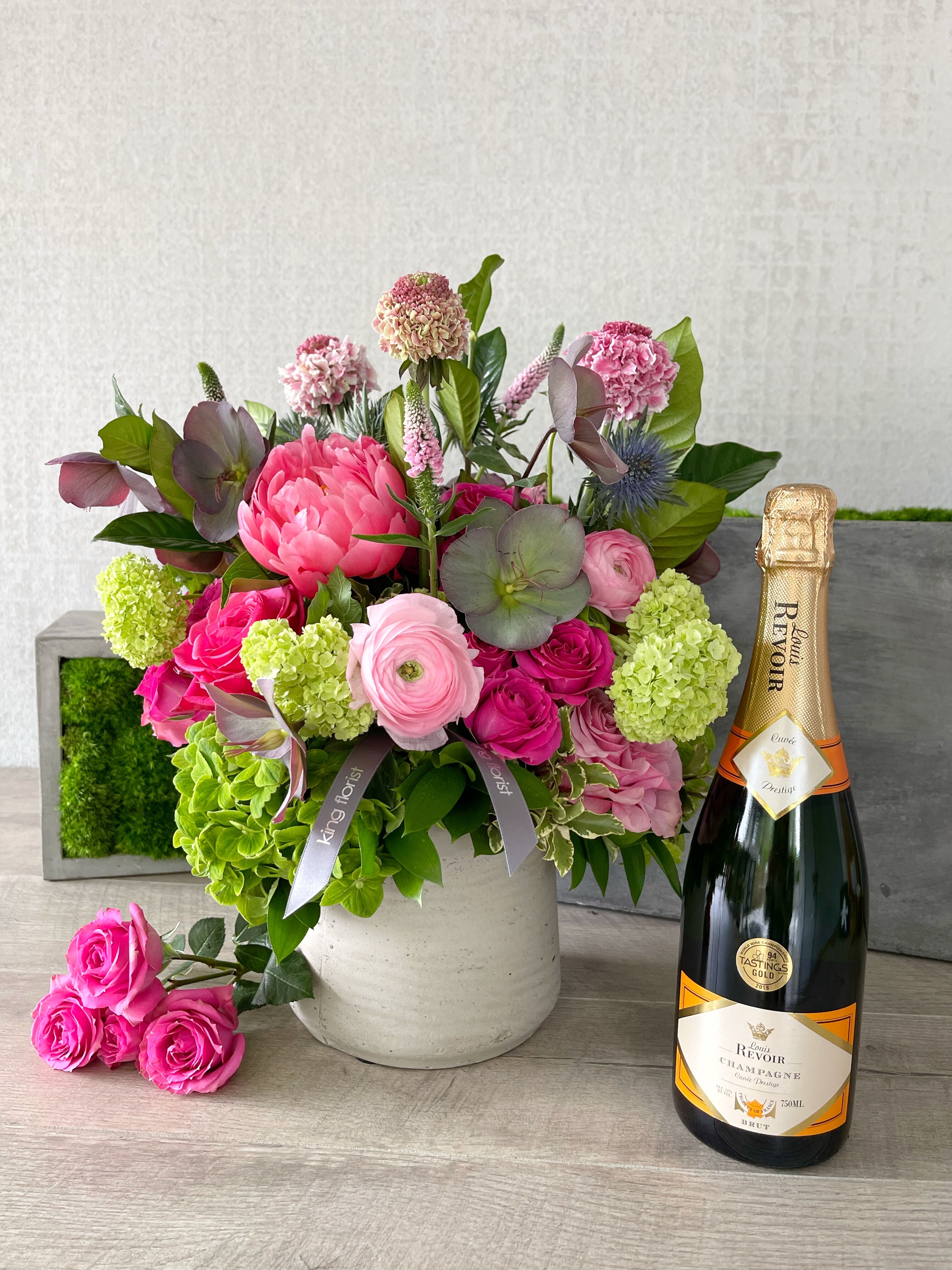Floral Arrangement and Champagne size, inches height and inches wide.