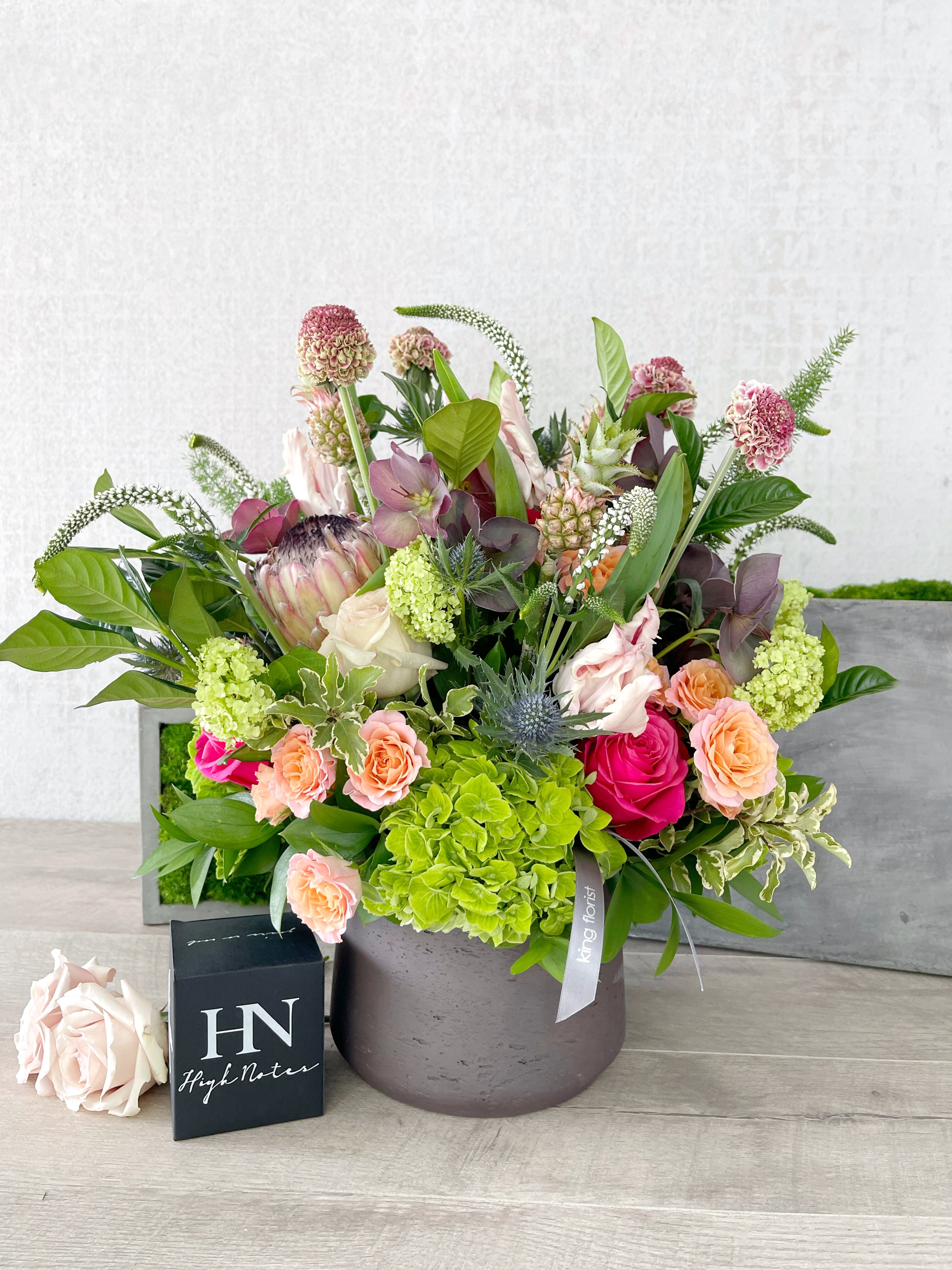 Floral Arrangement and Candle size, inches height and inches wide.