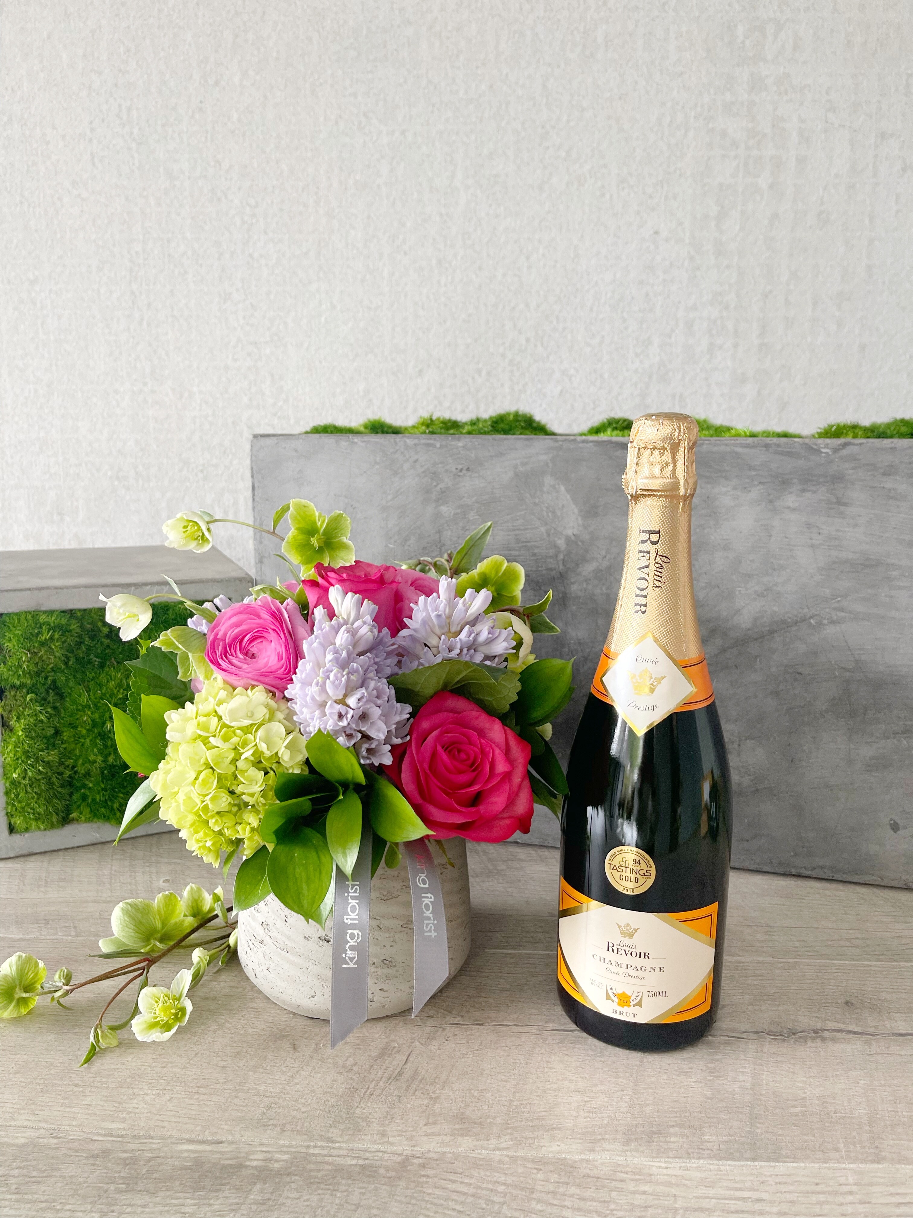 Floral Arrangement and Champagne size, inches height and inches wide.
