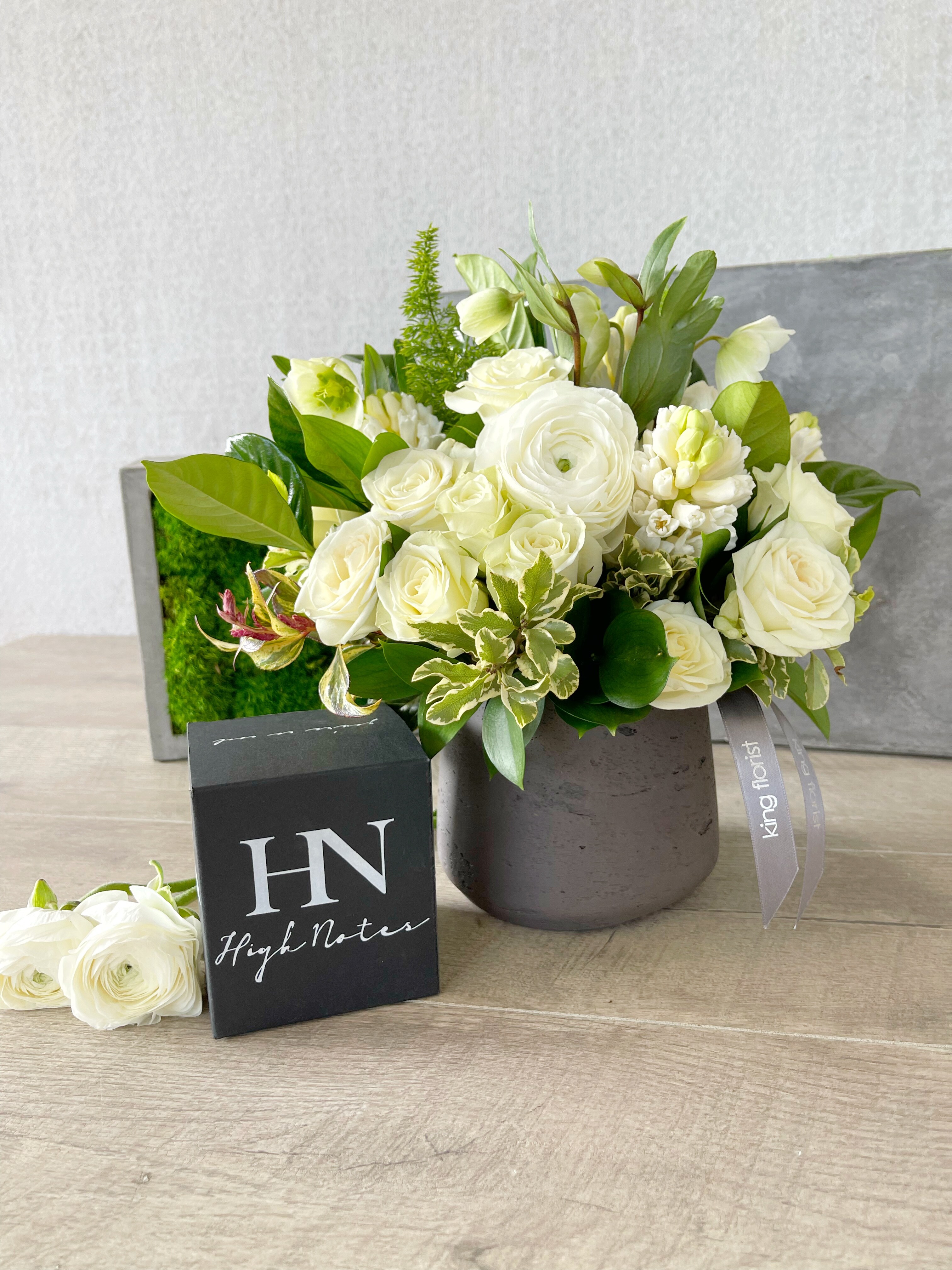 Floral Arrangement and Candle size, inches height and inches wide.