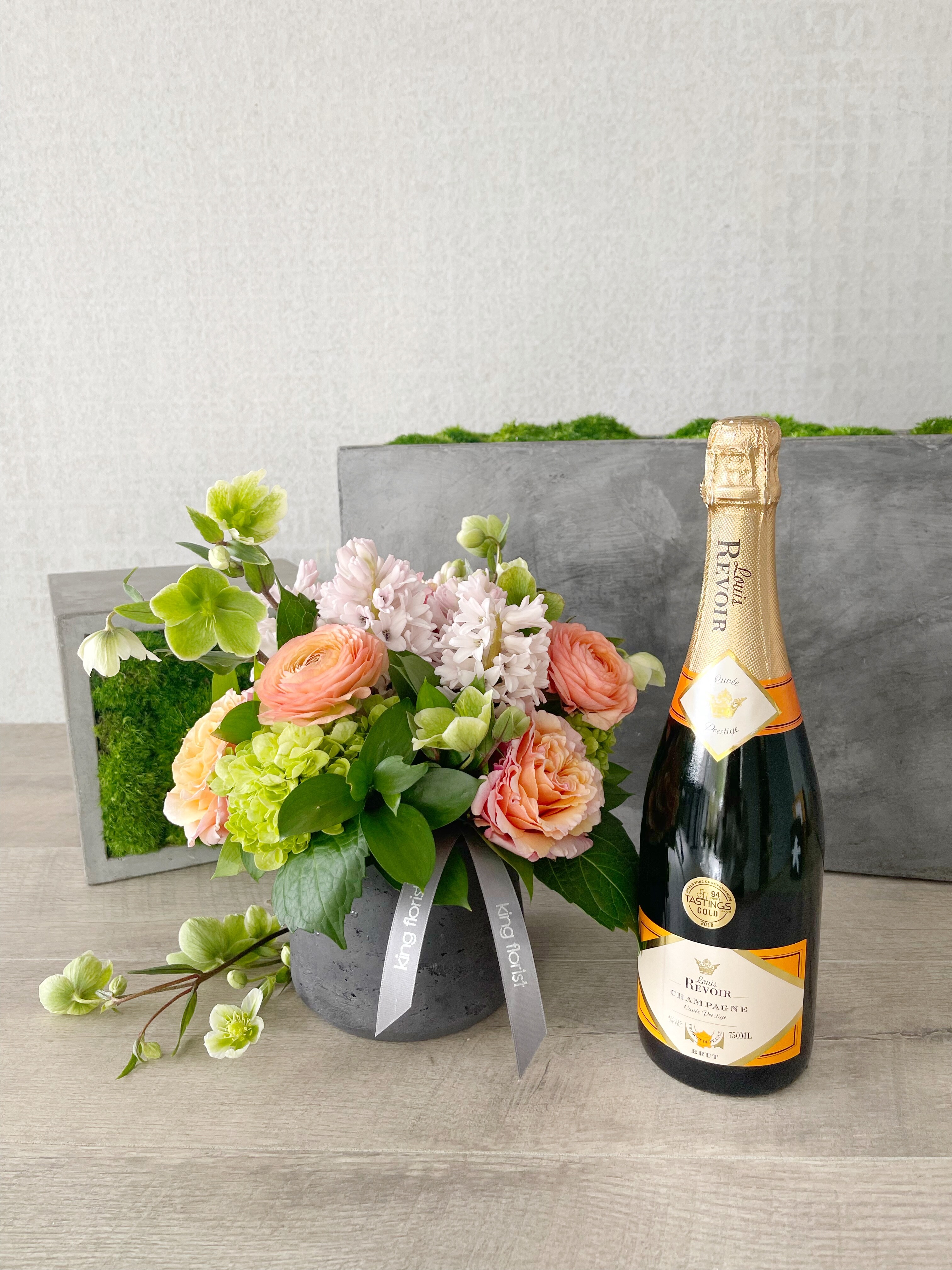 Floral Arrangement and Champagne size, inches height and inches wide.