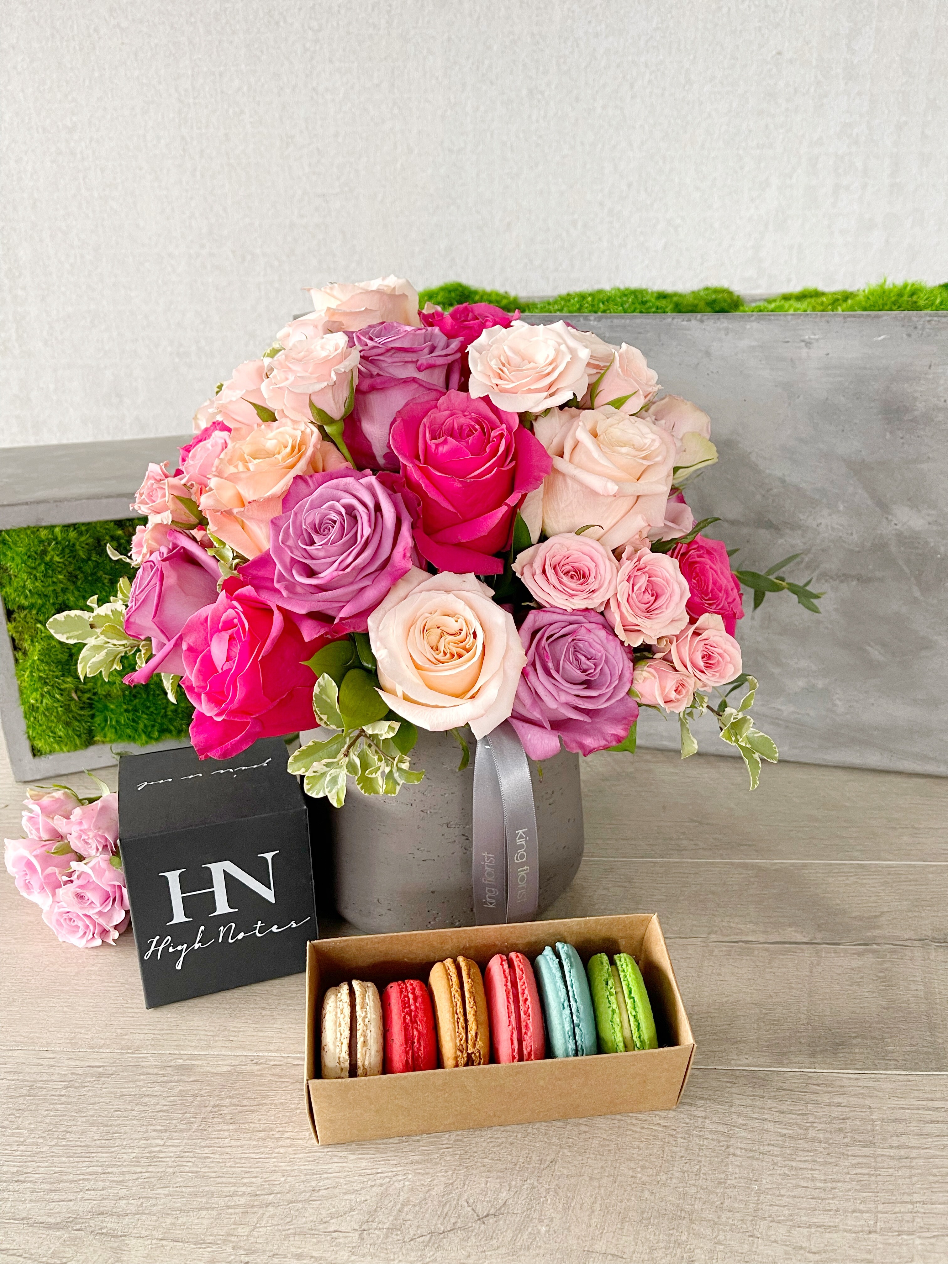 Floral Arrangement, Half dozen Macarons, and Candle size, inches height and inches wide.