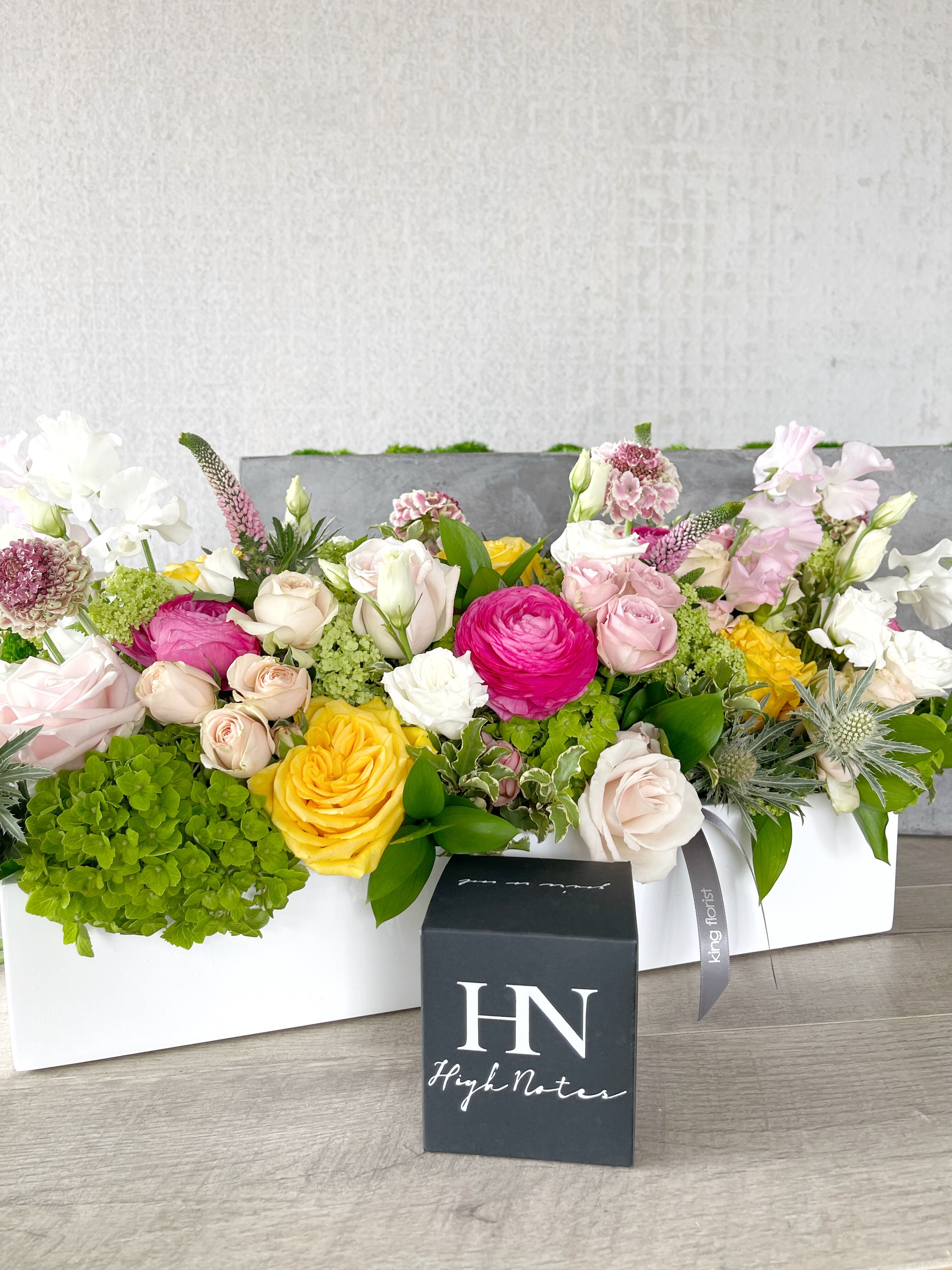Floral Arrangement and Candle size, inches height and inches wide.