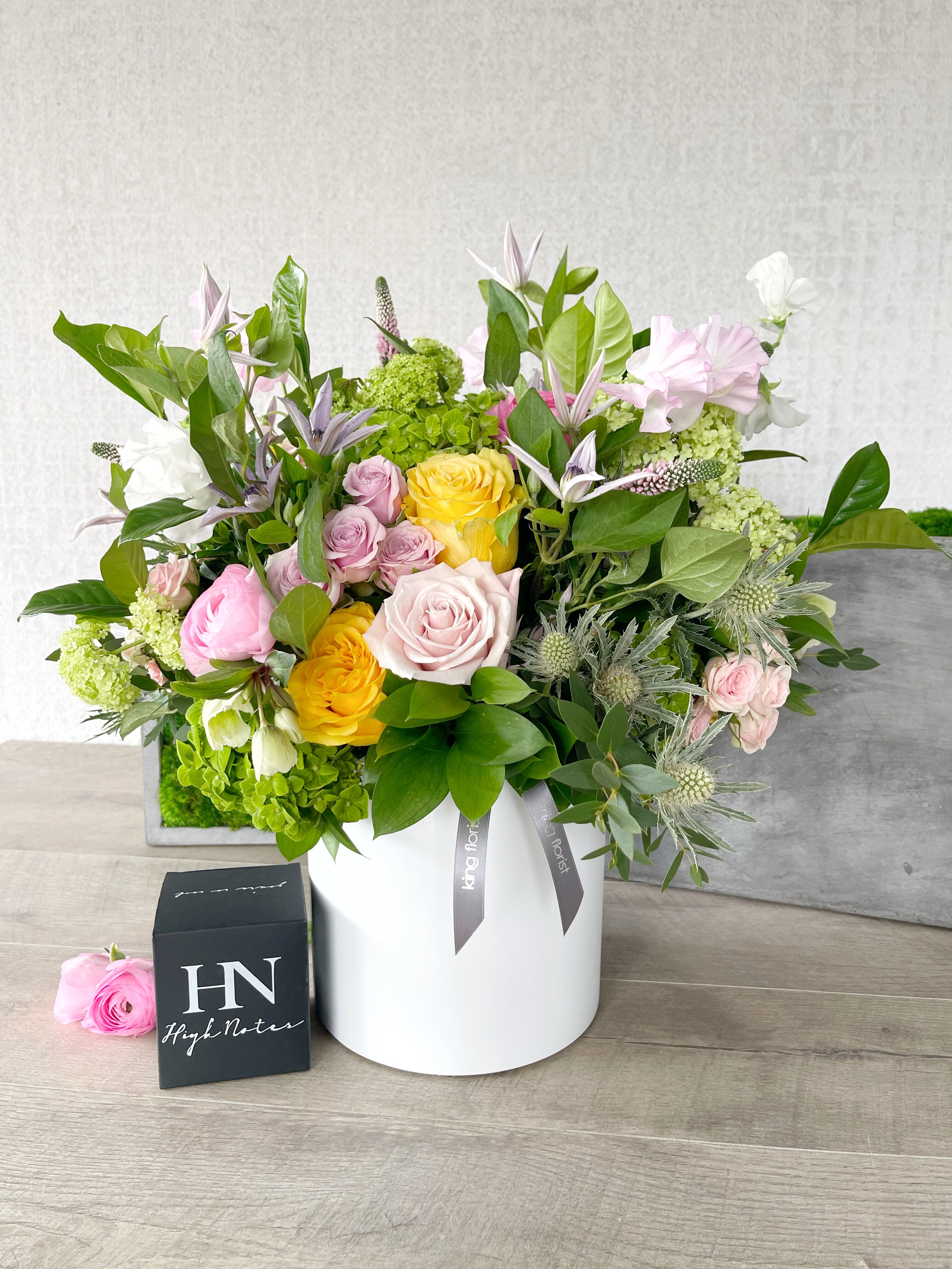 Floral Arrangement and Candle size, inches height and inches wide.