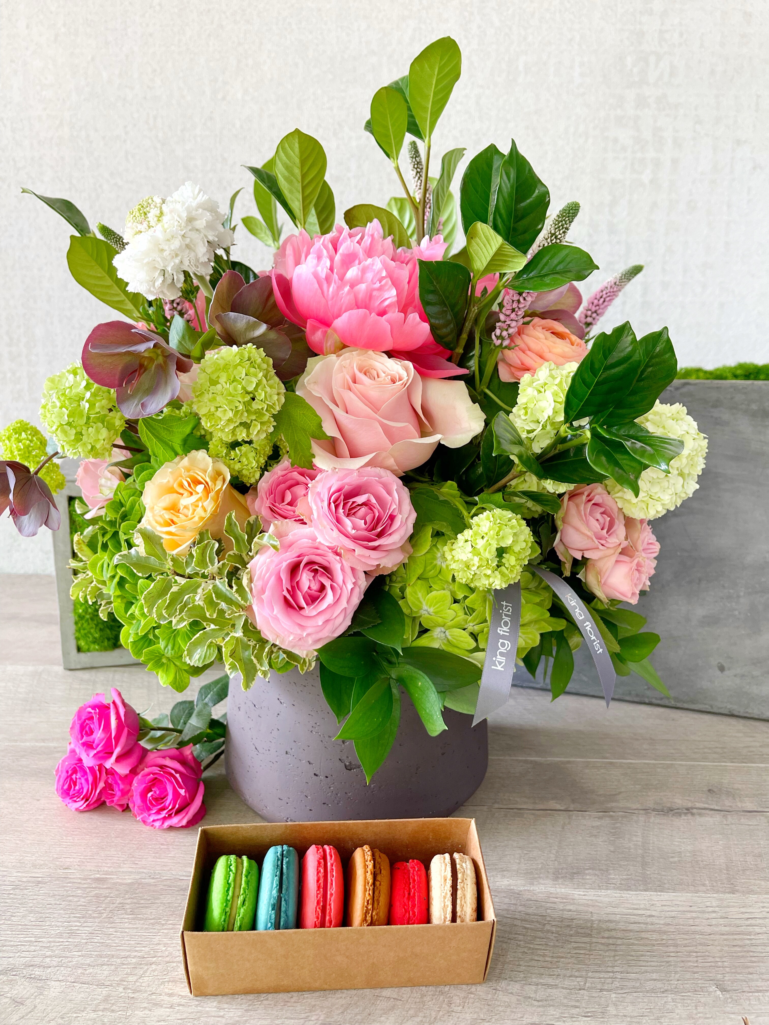 Floral Arrangement and Half Dozen Macarons size, inches height and inches wide.