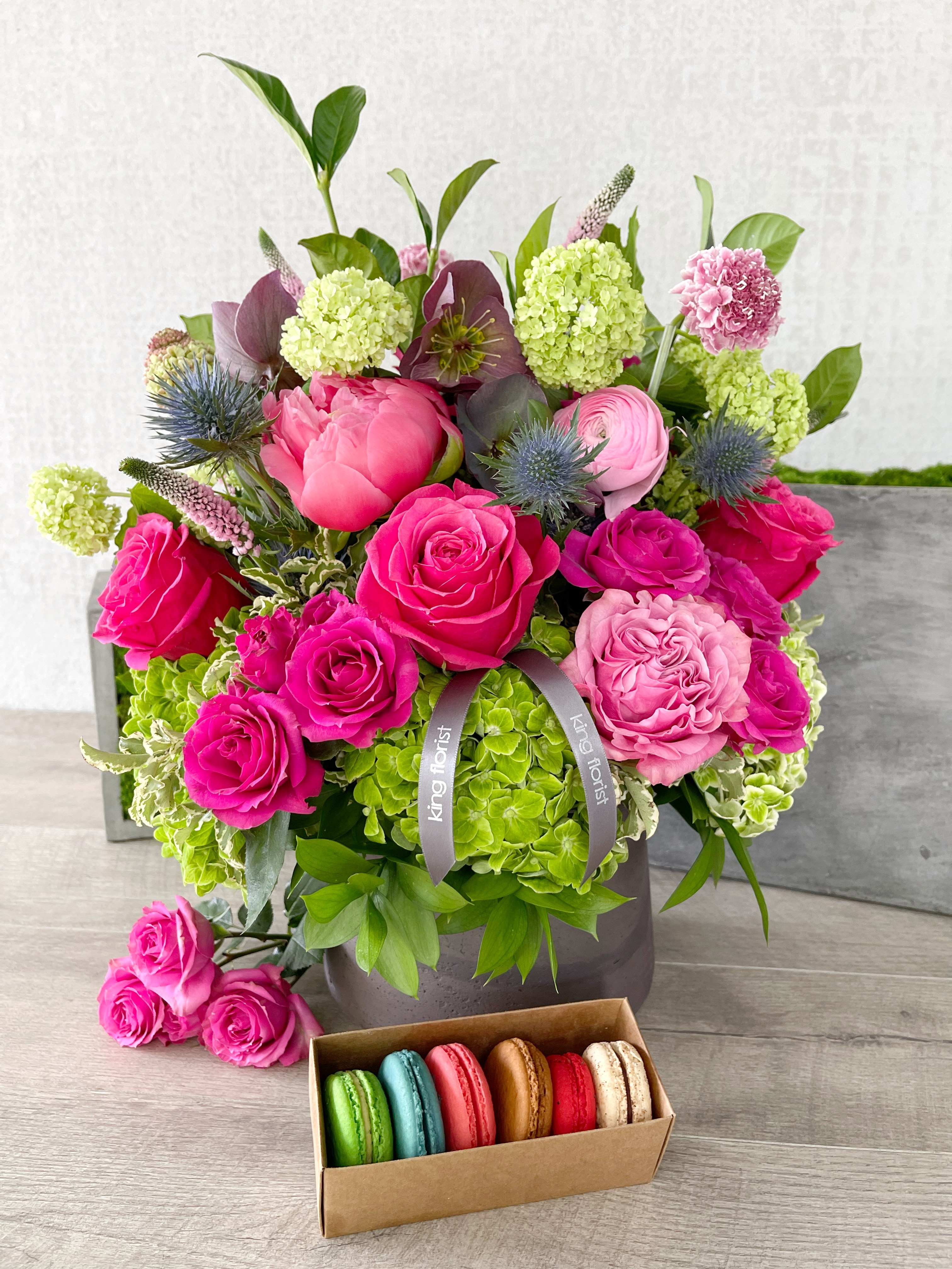 Floral Arrangement and Half Dozen Macarons size, inches height and inches wide.