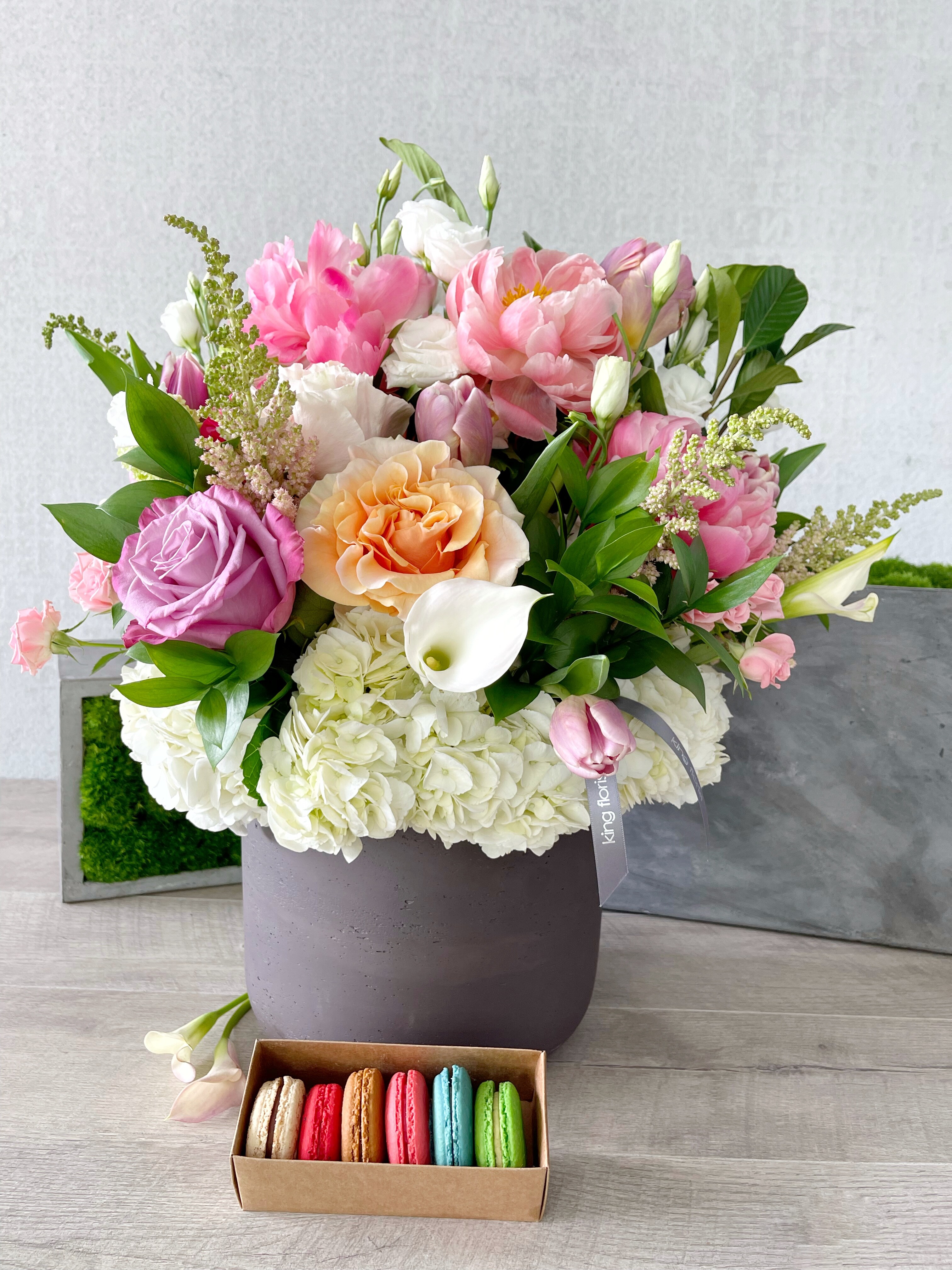 Floral Arrangement and Half Dozen Macarons size, inches height and inches wide.