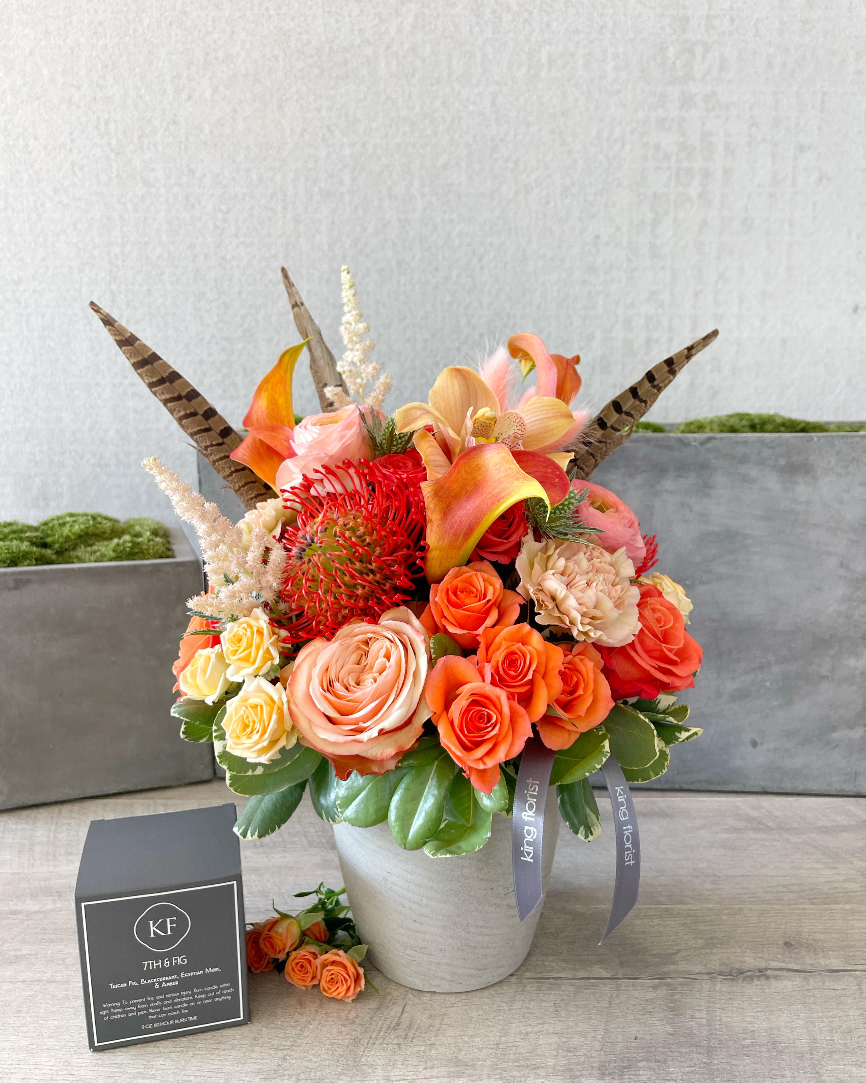 Floral Arrangement and Candle size, inches height and inches wide.