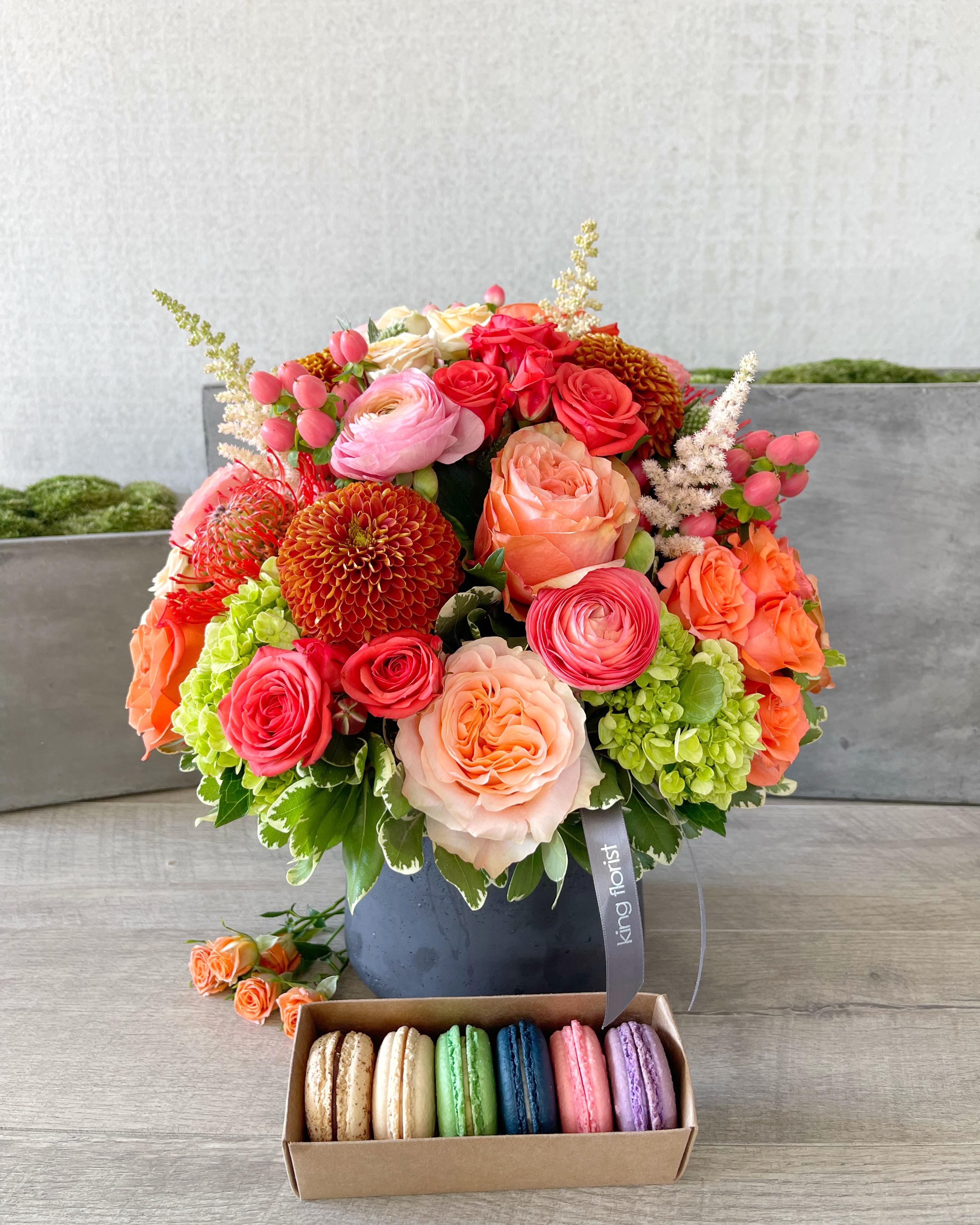 Floral Arrangement and Half Dozen Macarons size, inches height and inches wide.